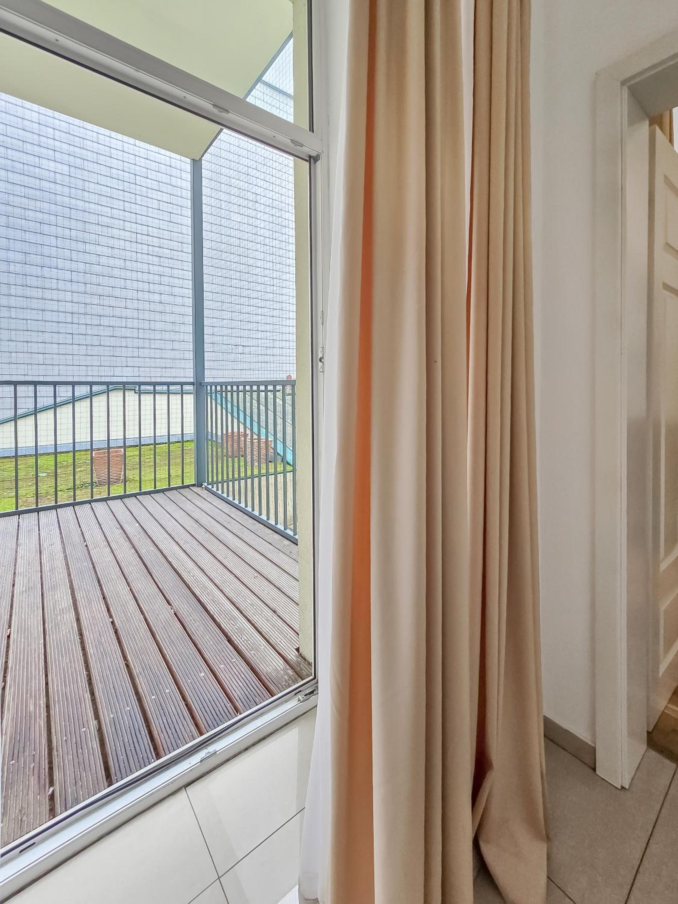 Spacious 3-Bedroom Retreat with Balcony for 8 Near Millennium Tower