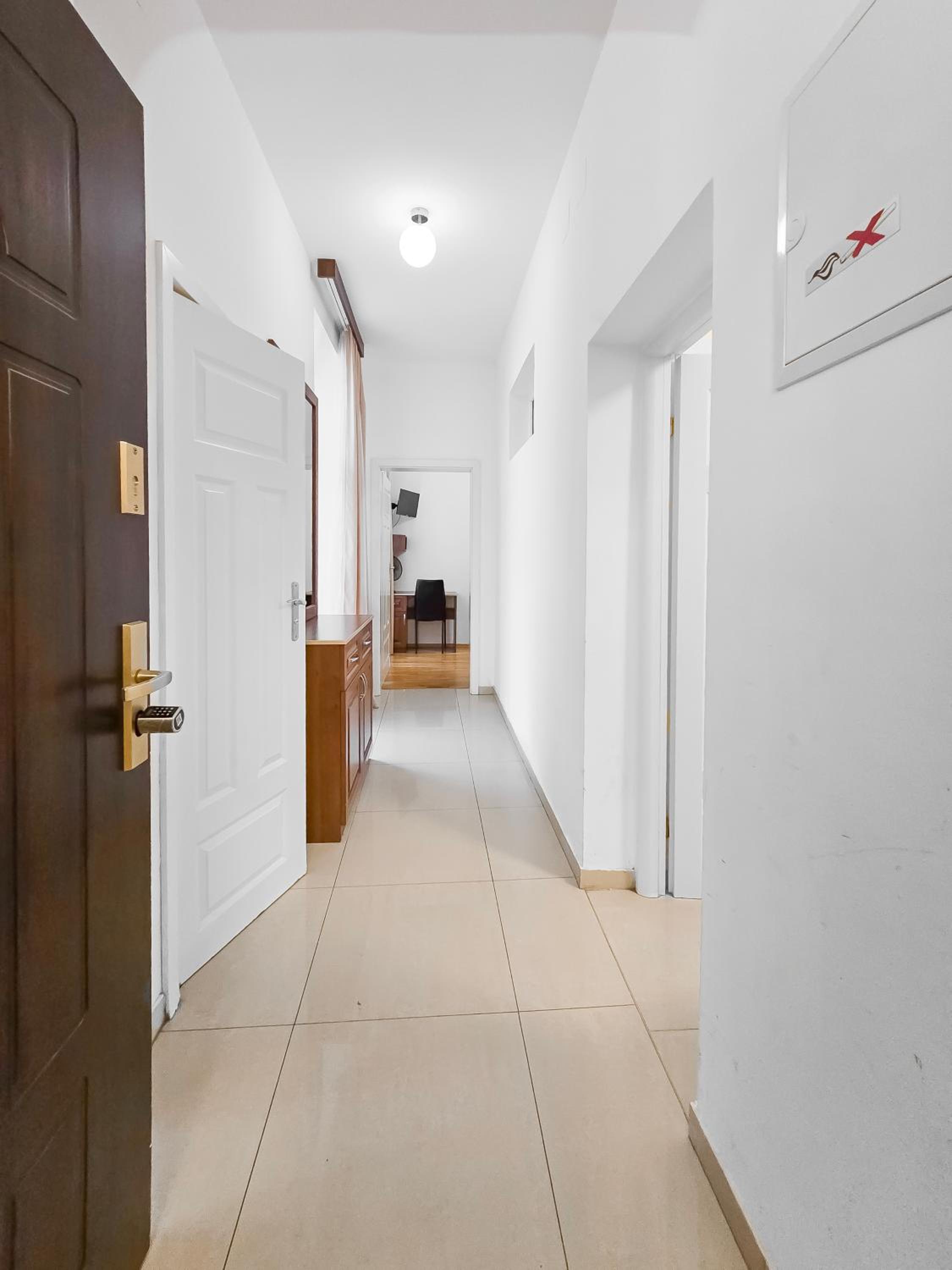 Spacious 3-Bedroom Retreat with Balcony for 8 Near Millennium Tower