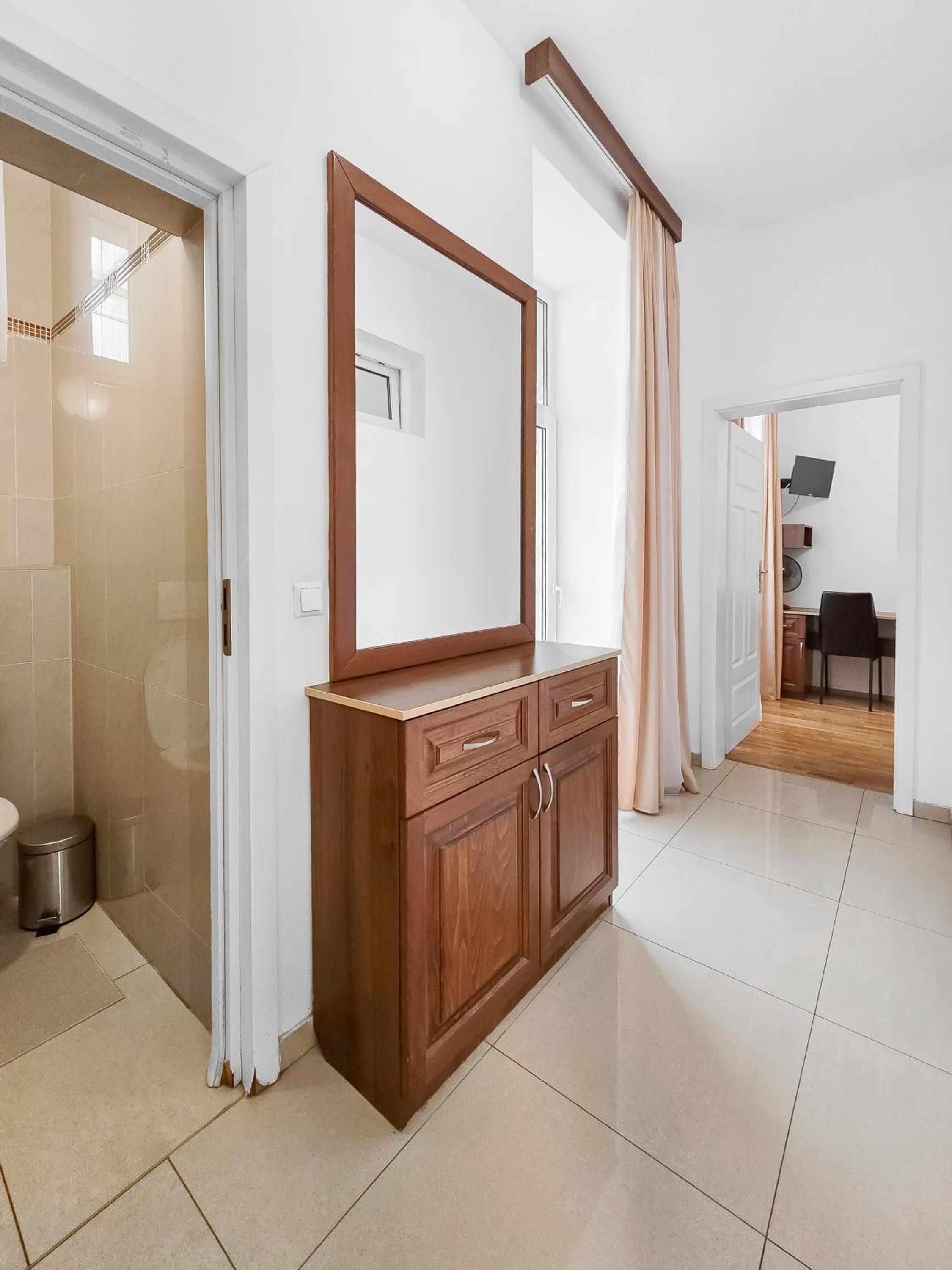 Spacious 3-Bedroom Retreat with Balcony for 8 Near Millennium Tower