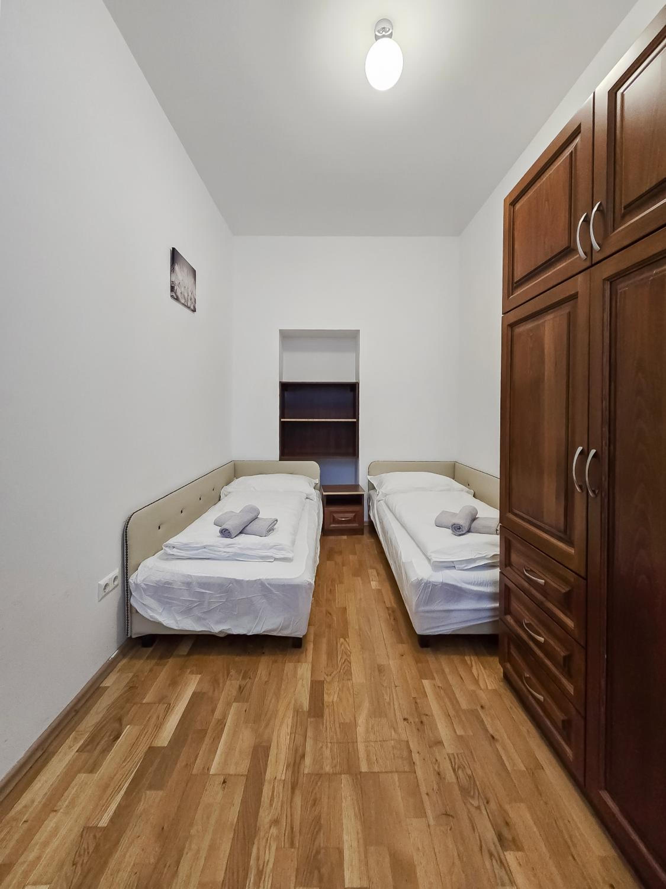 Spacious 3-Bedroom Retreat with Balcony for 8 Near Millennium Tower