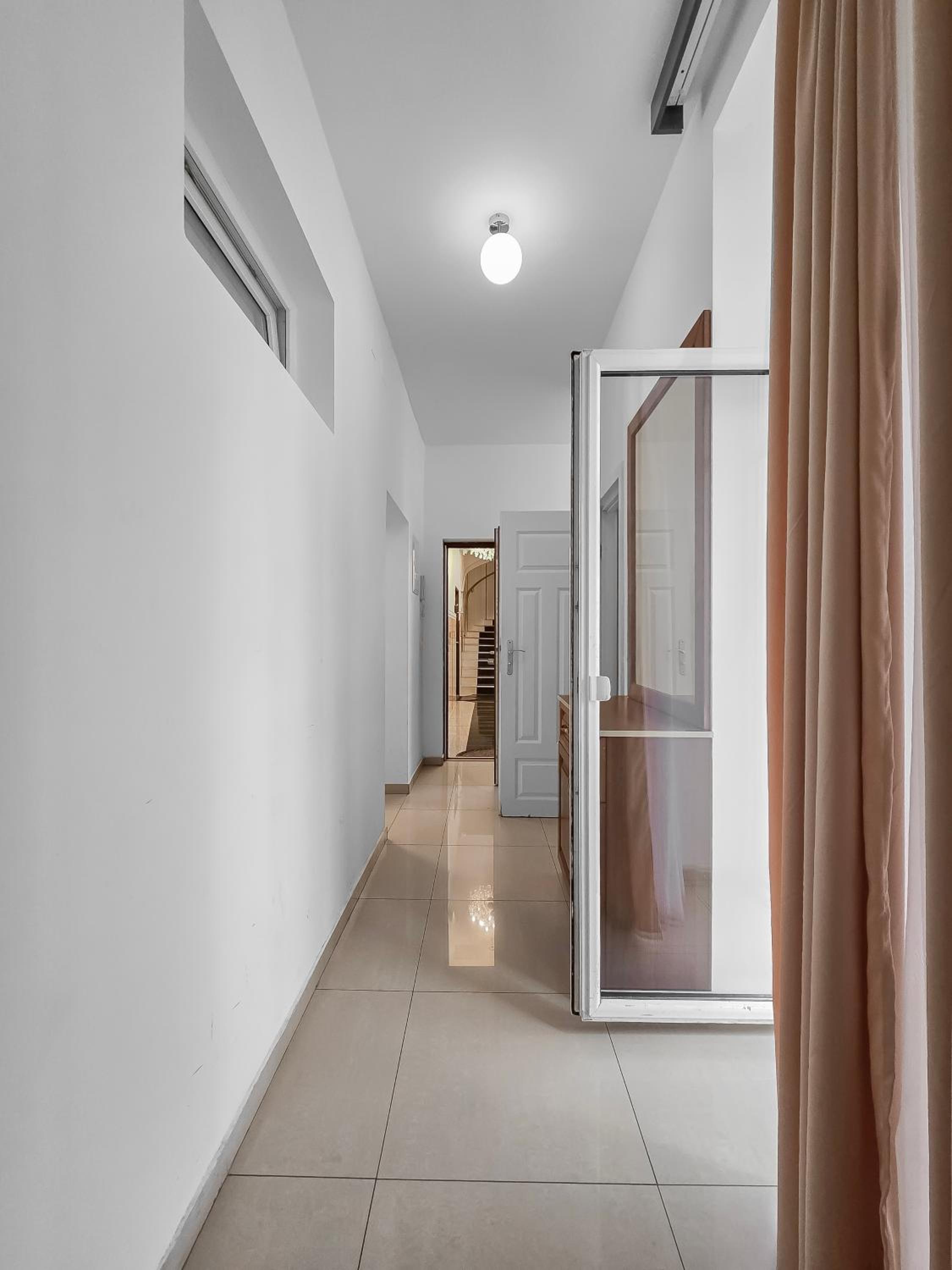 Spacious 3-Bedroom Retreat with Balcony for 8 Near Millennium Tower