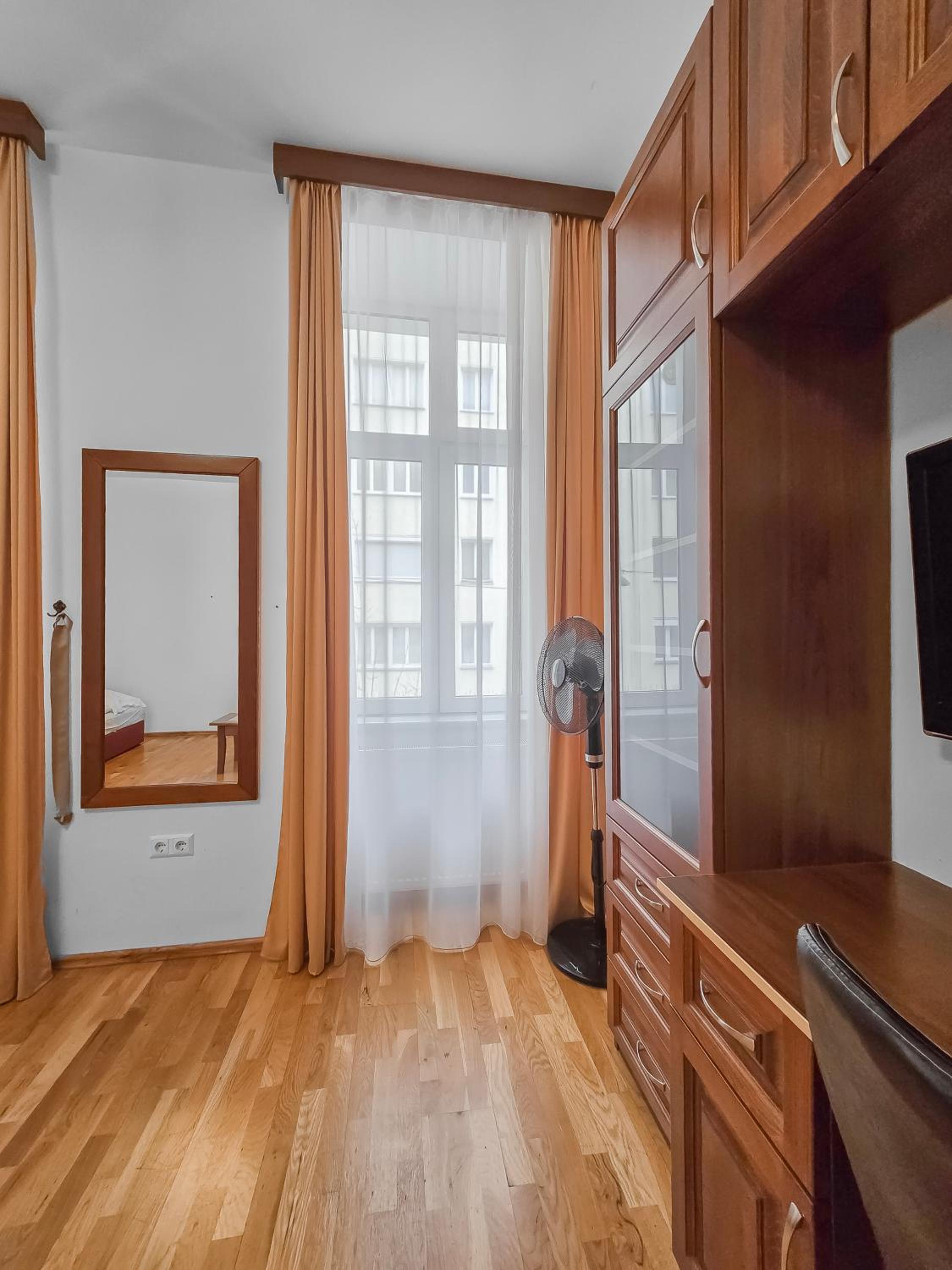 Spacious 3-Bedroom Retreat with Balcony for 8 Near Millennium Tower