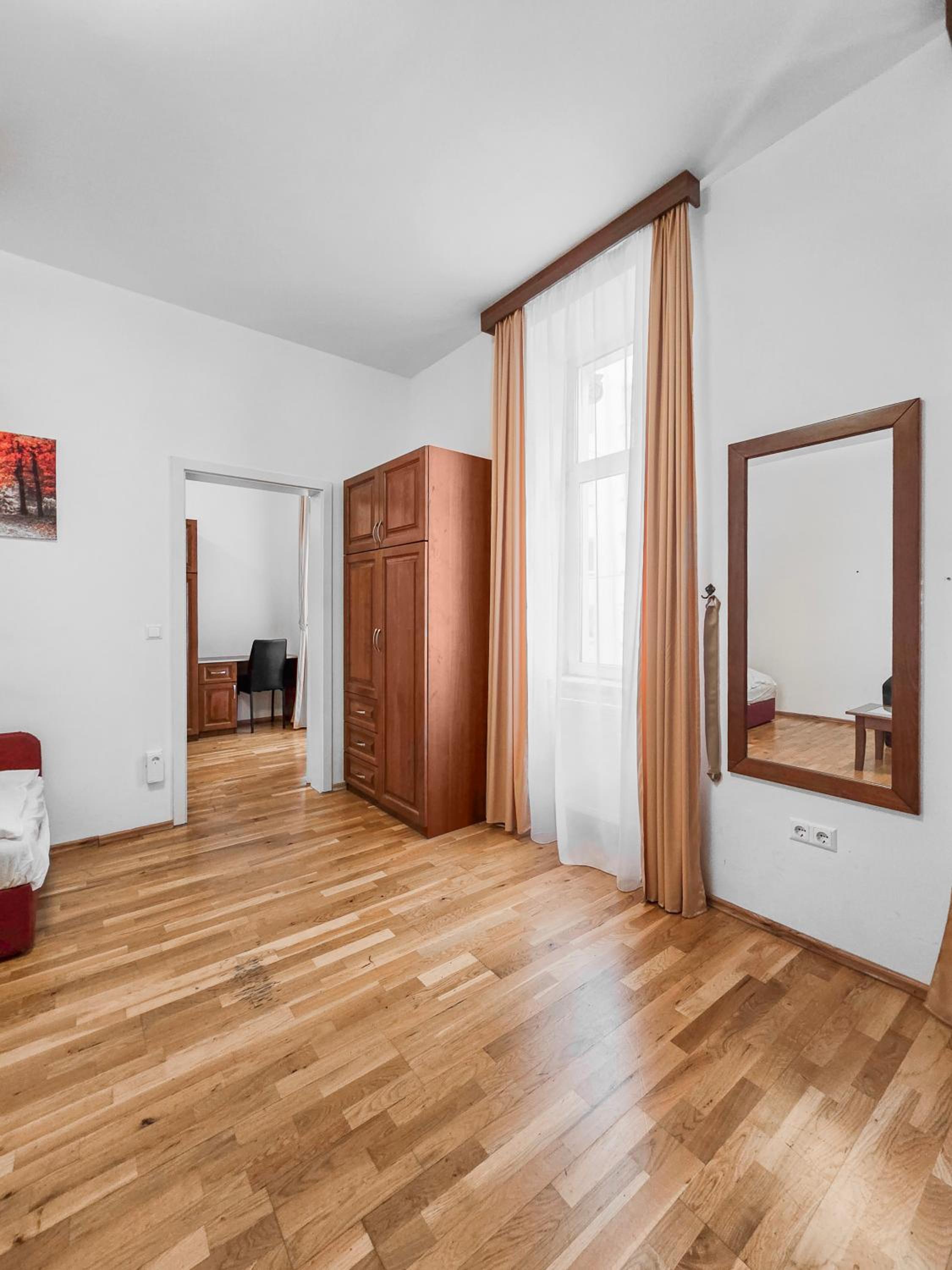 Spacious 3-Bedroom Retreat with Balcony for 8 Near Millennium Tower