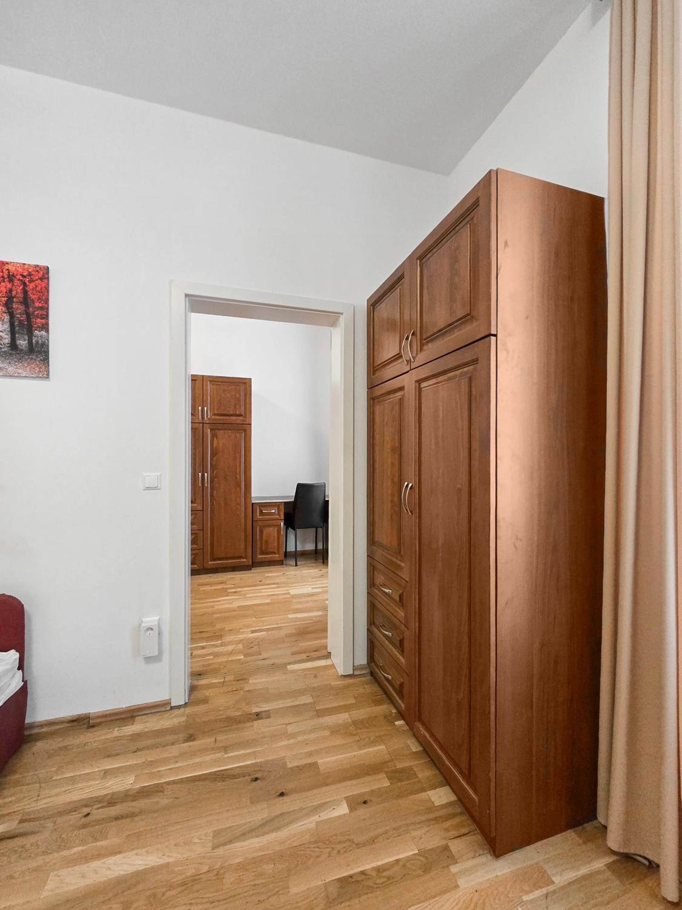 Spacious 3-Bedroom Retreat with Balcony for 8 Near Millennium Tower
