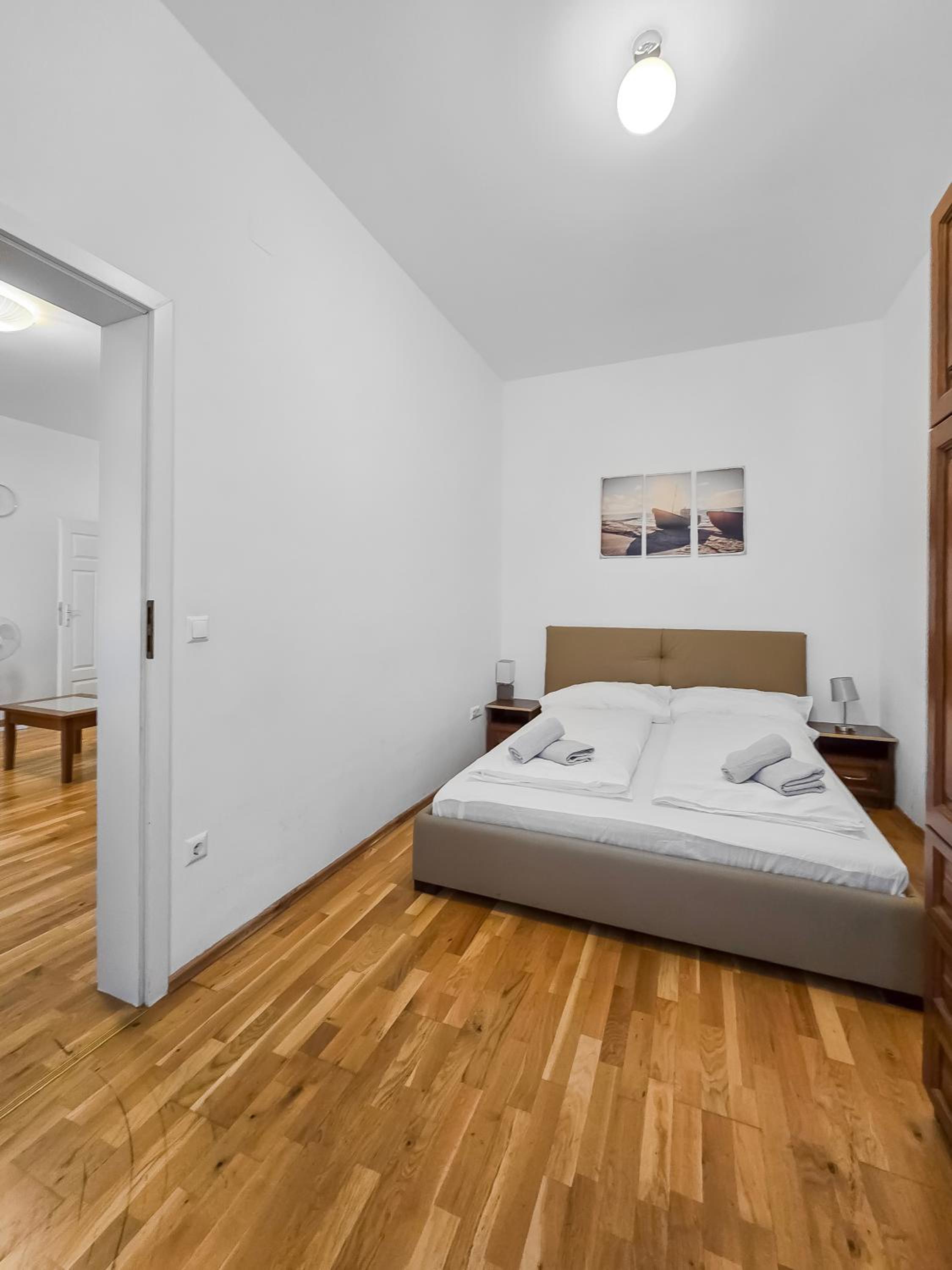 Spacious 3-Bedroom Retreat with Balcony for 8 Near Millennium Tower