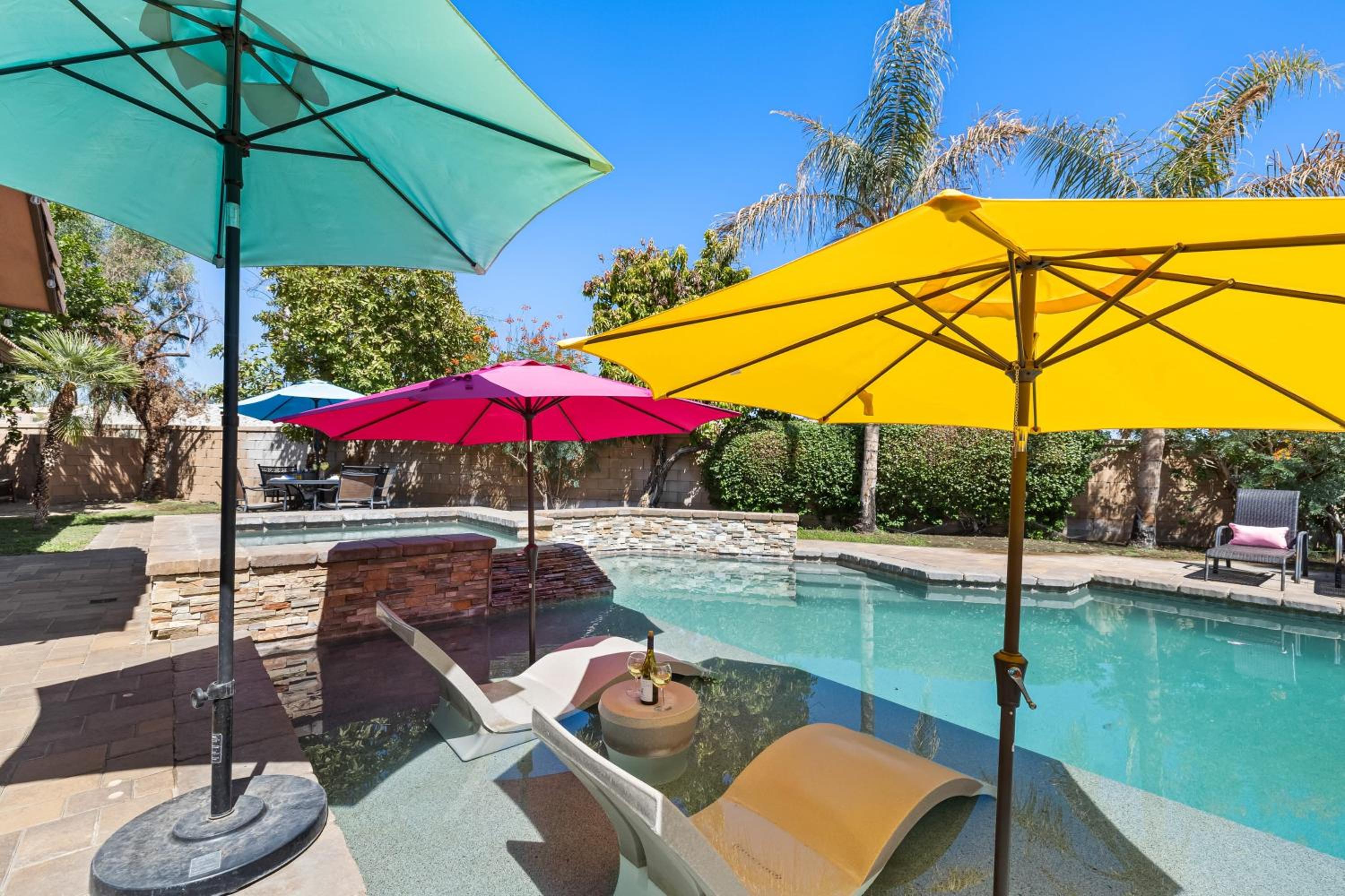 Luxury Oasis w Pool Hot Tub Fire Pit Games Big Yard Larrea by AvantStay