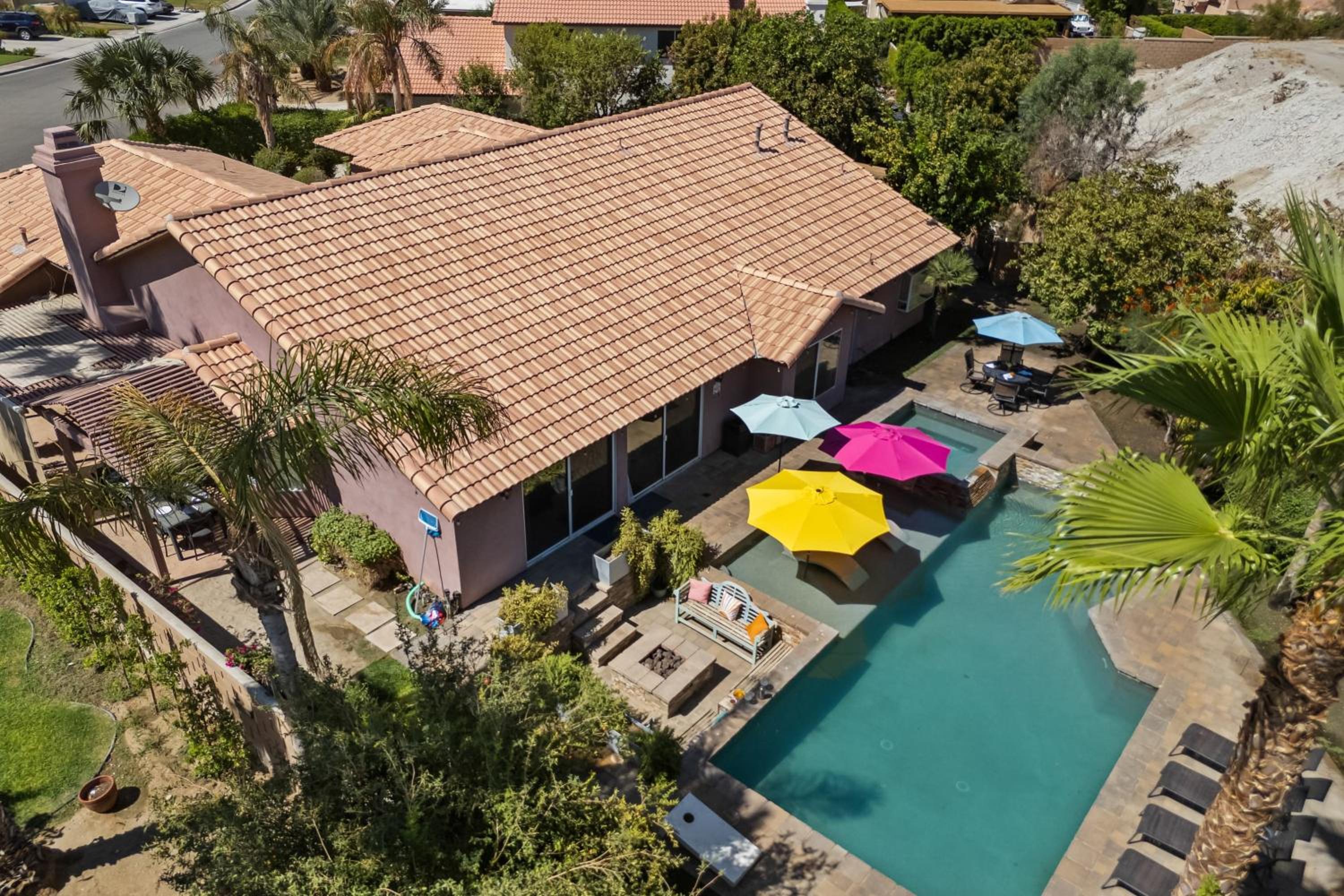 Luxury Oasis w Pool Hot Tub Fire Pit Games Big Yard Larrea by AvantStay
