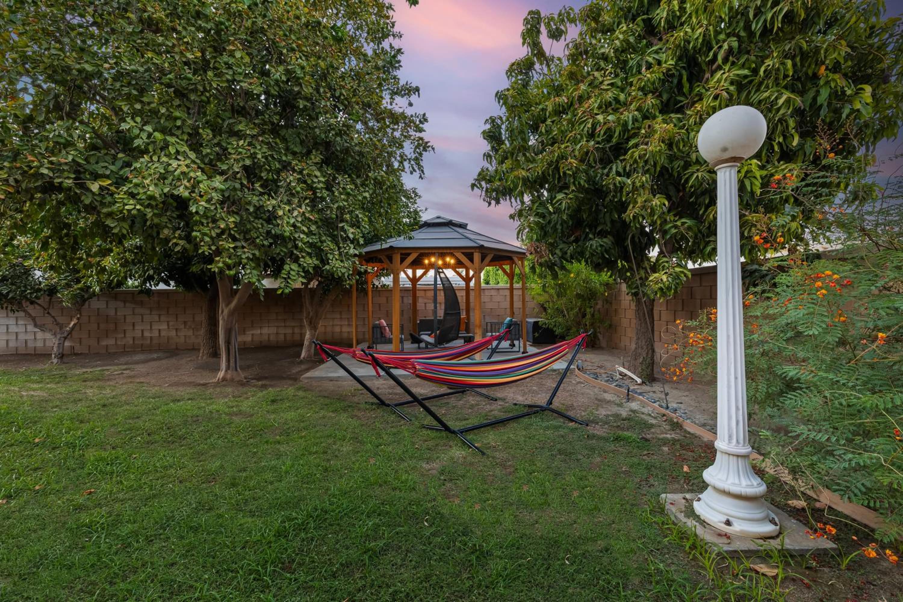 Luxury Oasis w Pool Hot Tub Fire Pit Games Big Yard Larrea by AvantStay
