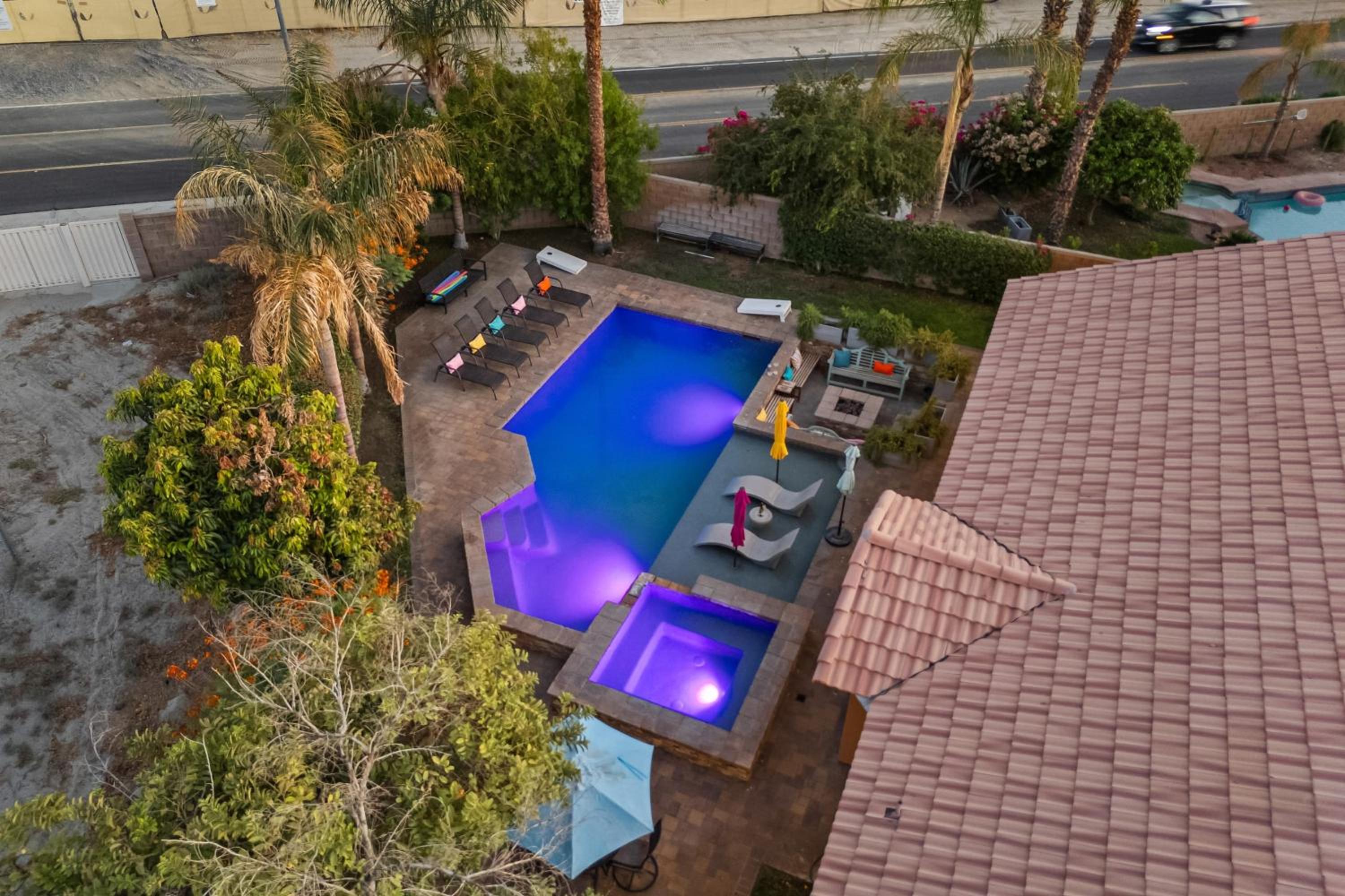 Luxury Oasis w Pool Hot Tub Fire Pit Games Big Yard Larrea by AvantStay