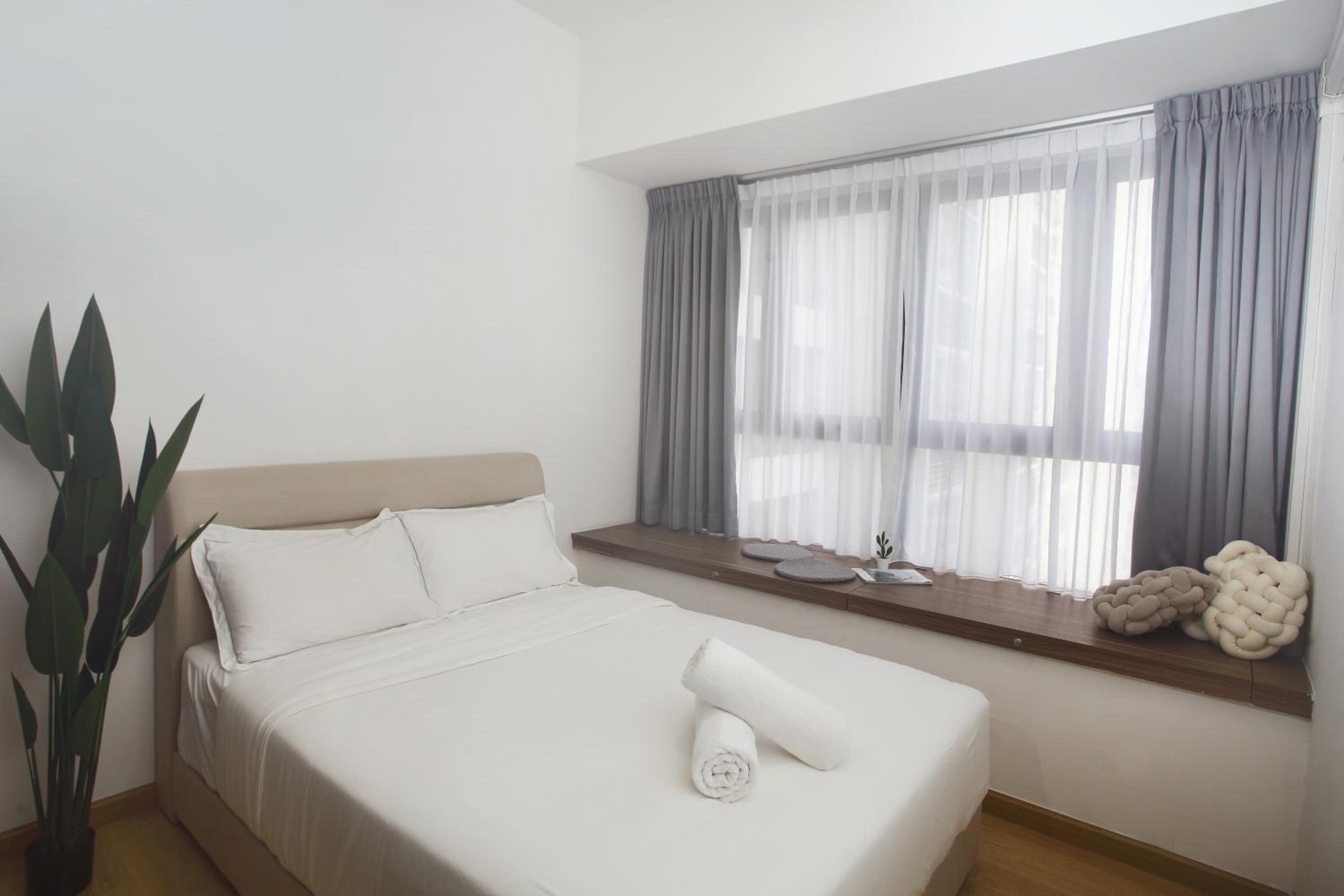 Cozy Beach Escape: 2BR Muji Gem