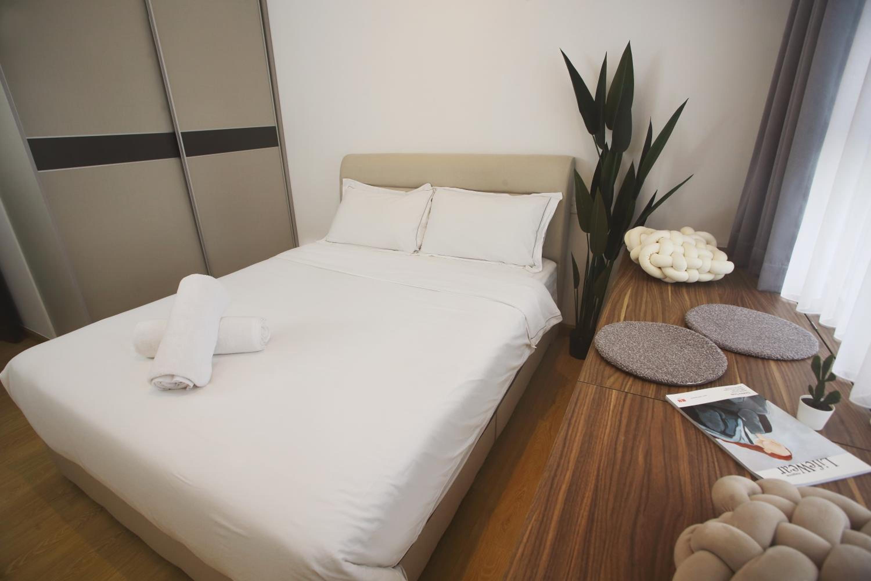 Cozy Beach Escape: 2BR Muji Gem