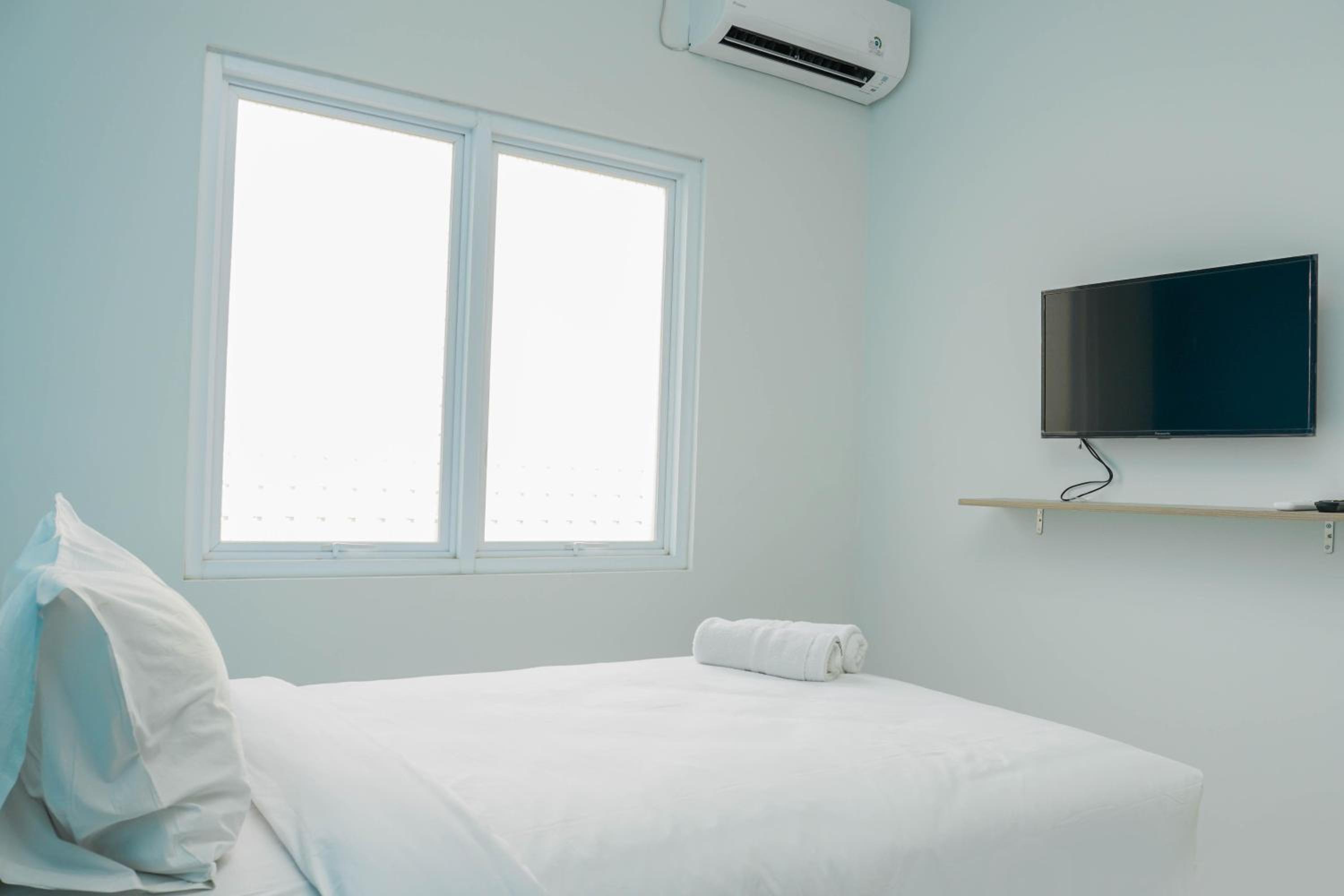 Studio Room at Guest House Way Seputih near Taman Anggrek By Travelio view 2