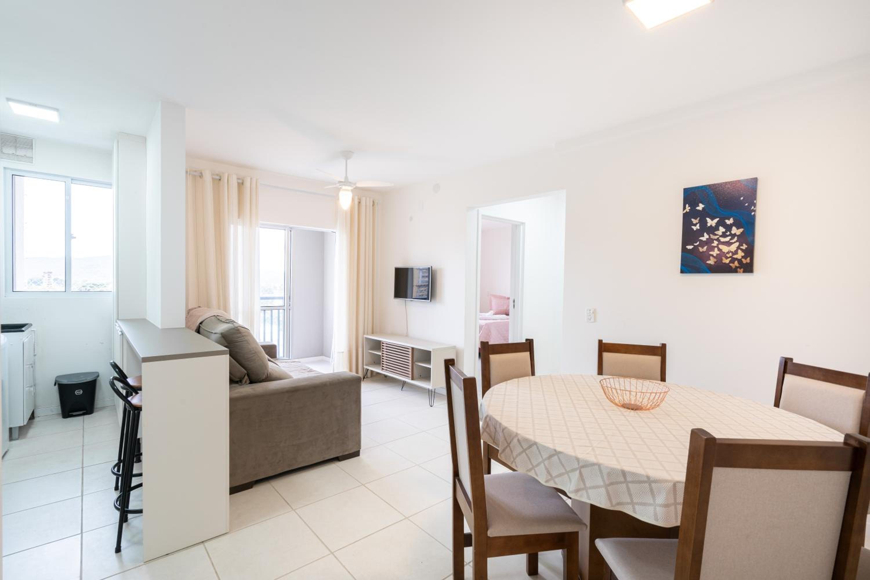 Apartamentos a 150 M DA PRAIA com SACADA, WI-FI, PISCINA, PORTARIA 24h, PLAYGROUND e vaga de GARAGEM