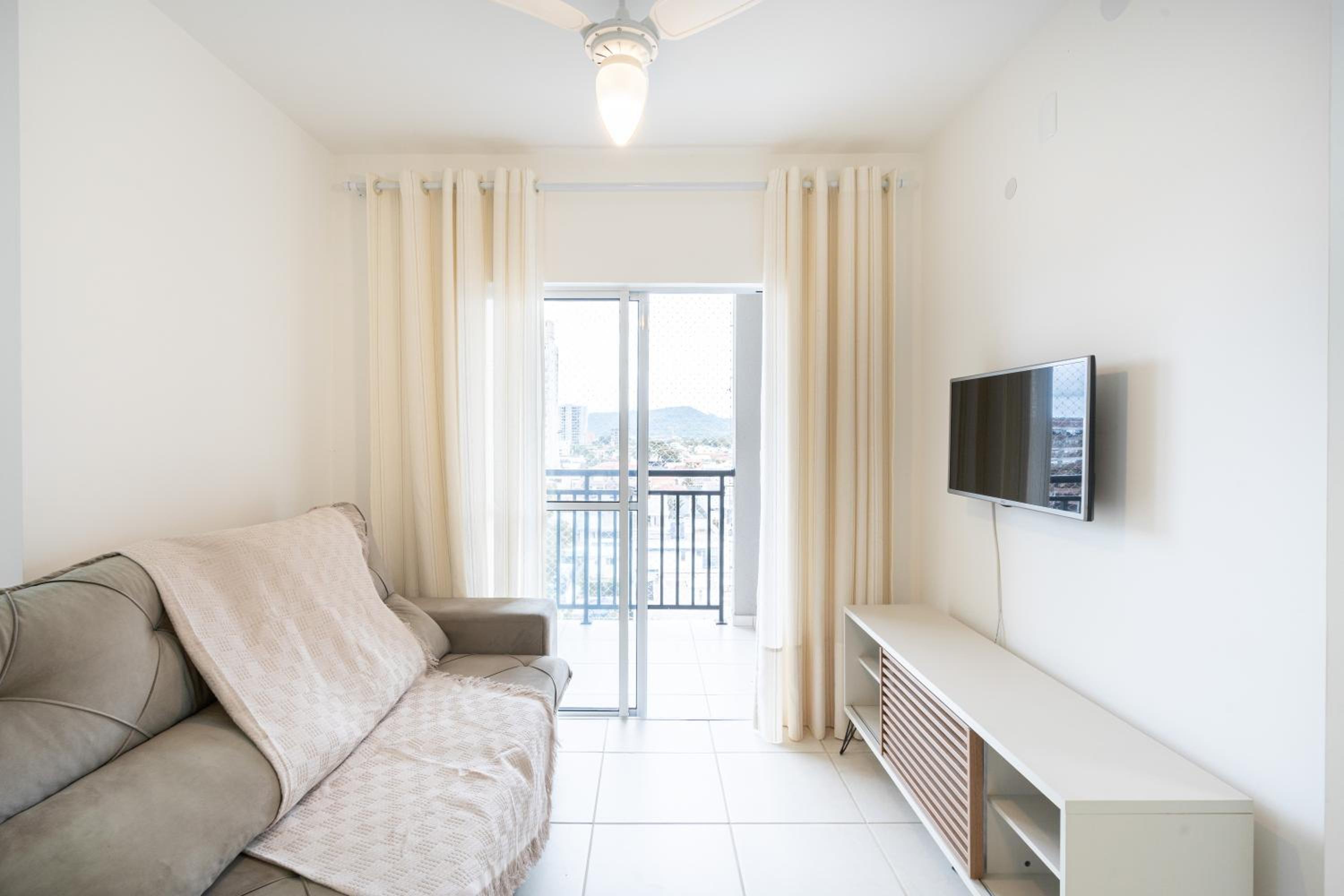 Apartamentos a 150 M DA PRAIA com SACADA, WI-FI, PISCINA, PORTARIA 24h, PLAYGROUND e vaga de GARAGEM