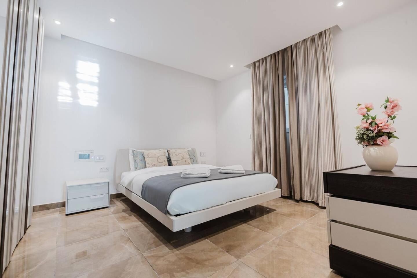 Dolmen Court Qawra fl13 w shared pool! by Homely photo 4