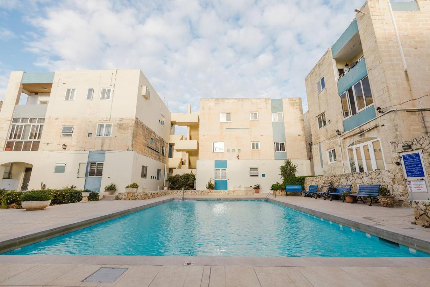 Dolmen Court Qawra fl13 w shared pool! by Homely photo 5