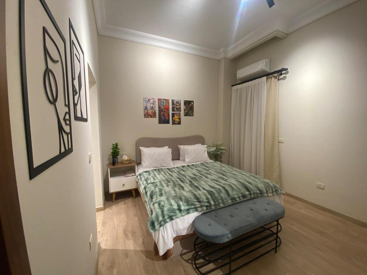 Peaceful Patio 2BR at AUC & Westin Hotel