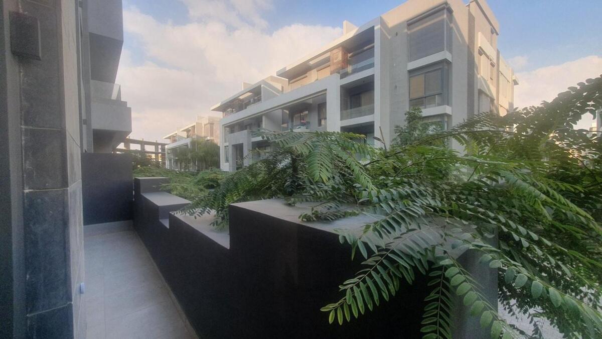 Peaceful Patio 2BR at AUC & Westin Hotel