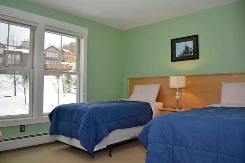 Topridge 4BR, 4BA Townhome with Breathtaking Mountain Views, Hot Tub, Ski In Ski Out, Sports Center