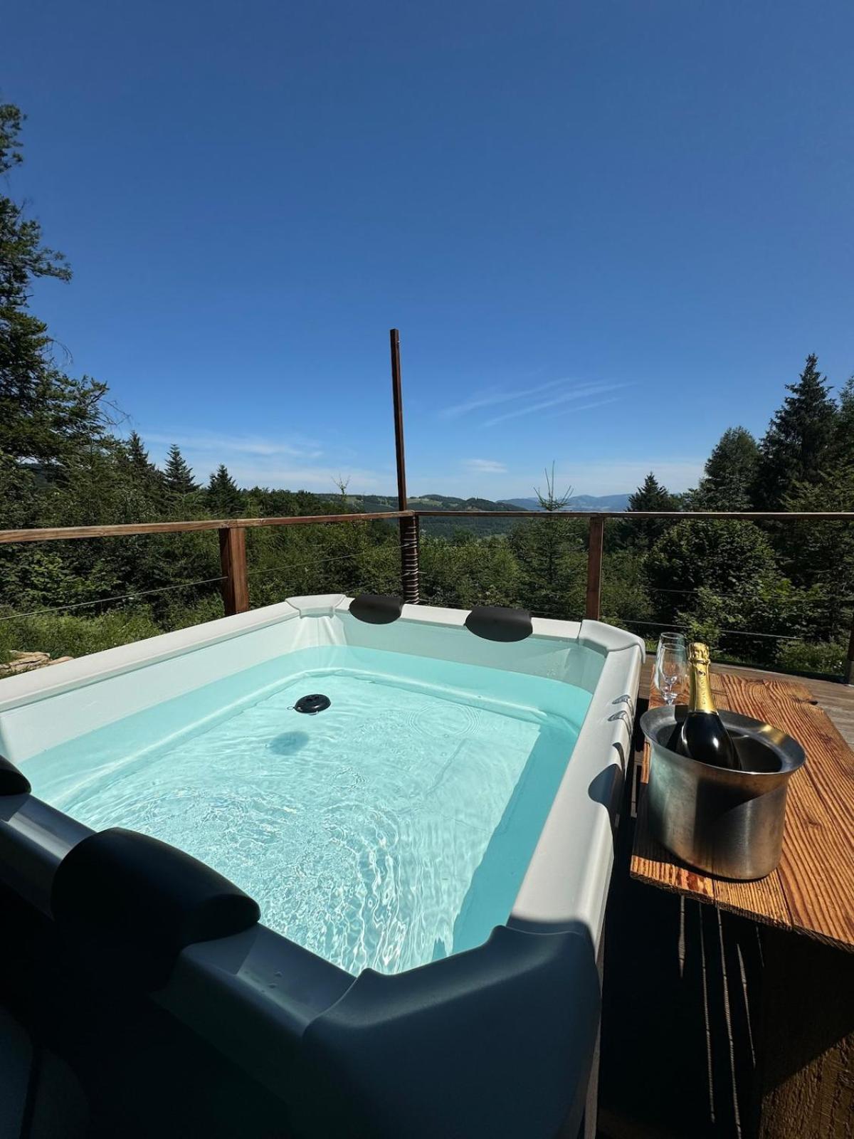 Chalet isolé avec jacuzzi et vue panoramique