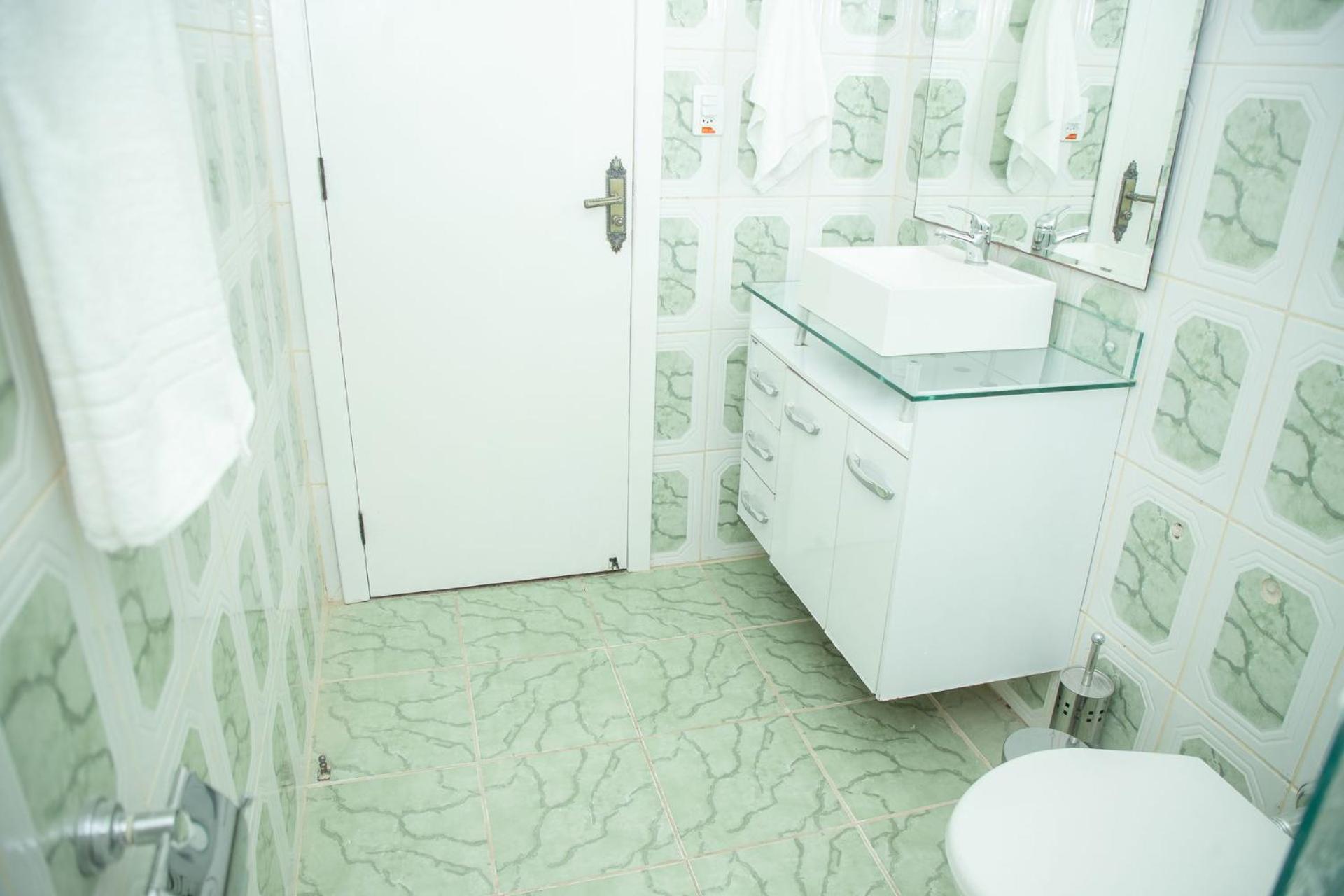 Conforto e Localização no Coração de POA SK1661
