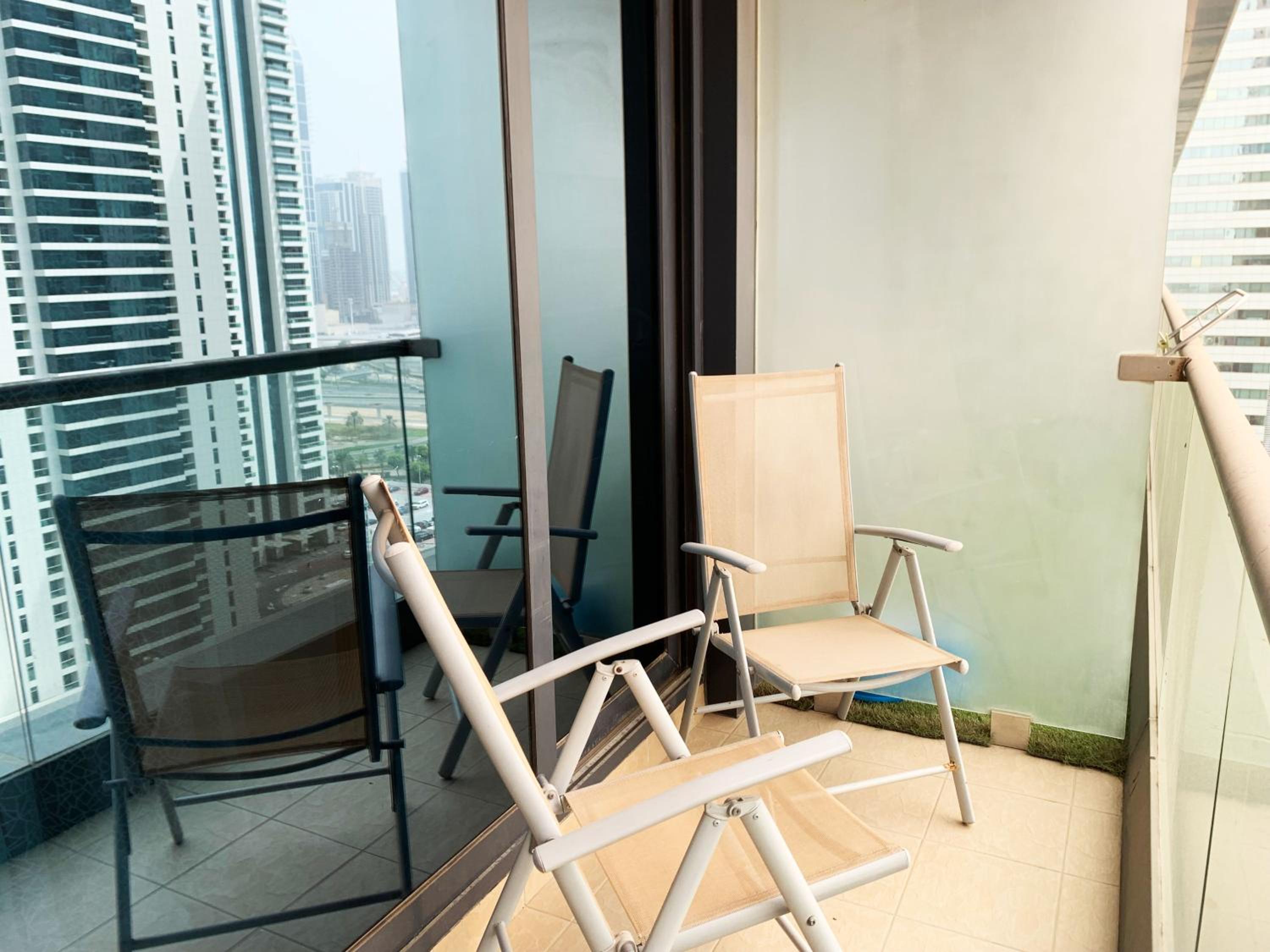 Click Stay - JLT - 2 Bedroom & Balcony Lakes view Entire Apartment -AZ