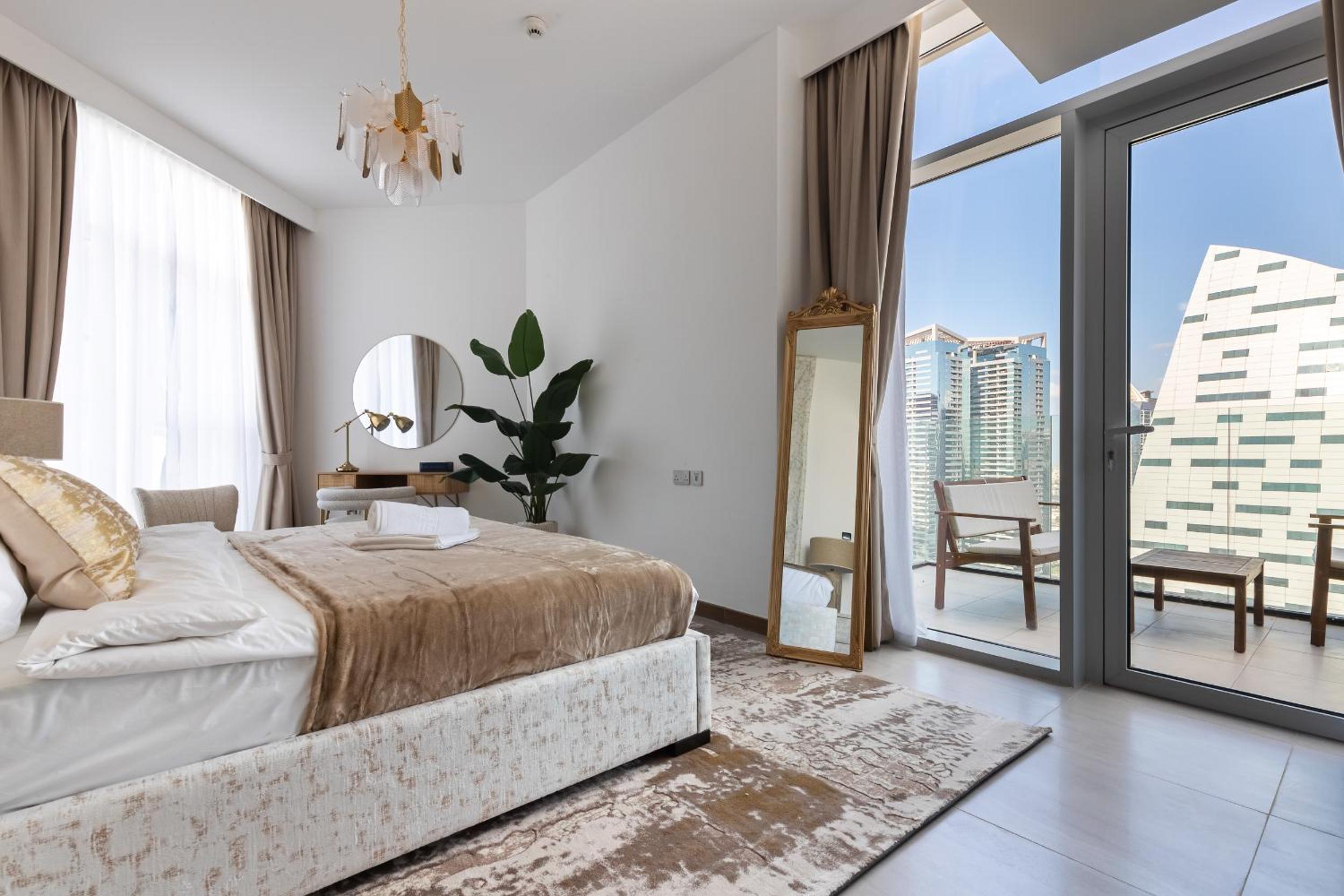 Simply Comfort Vacation Homes Rental in Missoni Top Floor with Sea, Canal and Burj Khalifa Views