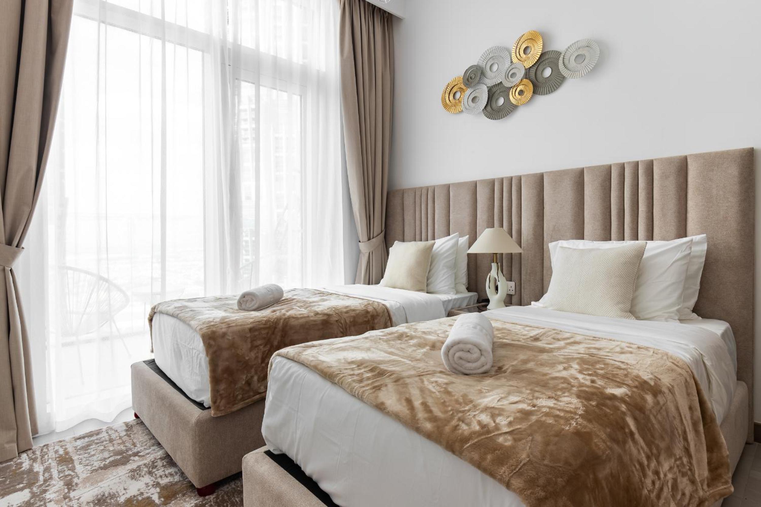 Simply Comfort Vacation Homes Rental in Missoni Top Floor with Sea, Canal and Burj Khalifa Views