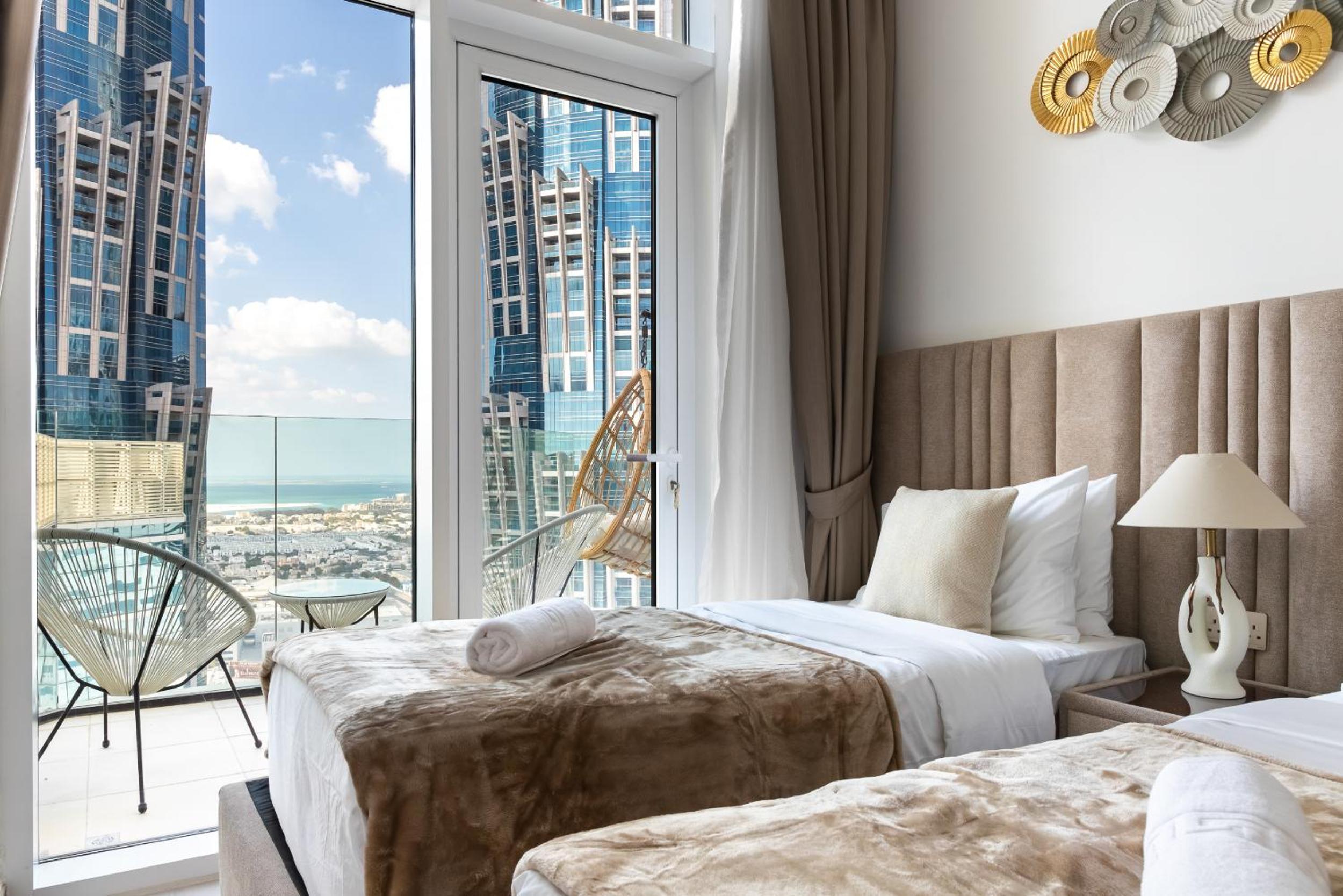 Simply Comfort Vacation Homes Rental in Missoni Top Floor with Sea, Canal and Burj Khalifa Views