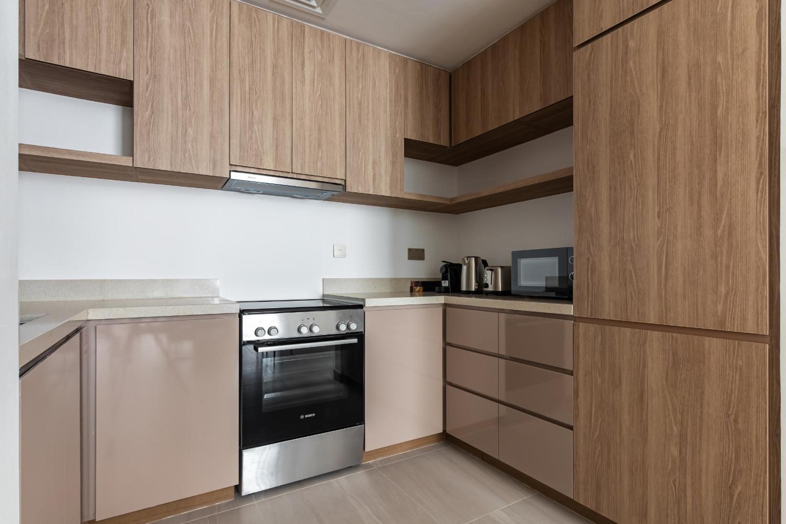 Simply Comfort Vacation Homes Rental in Missoni Top Floor with Sea, Canal and Burj Khalifa Views