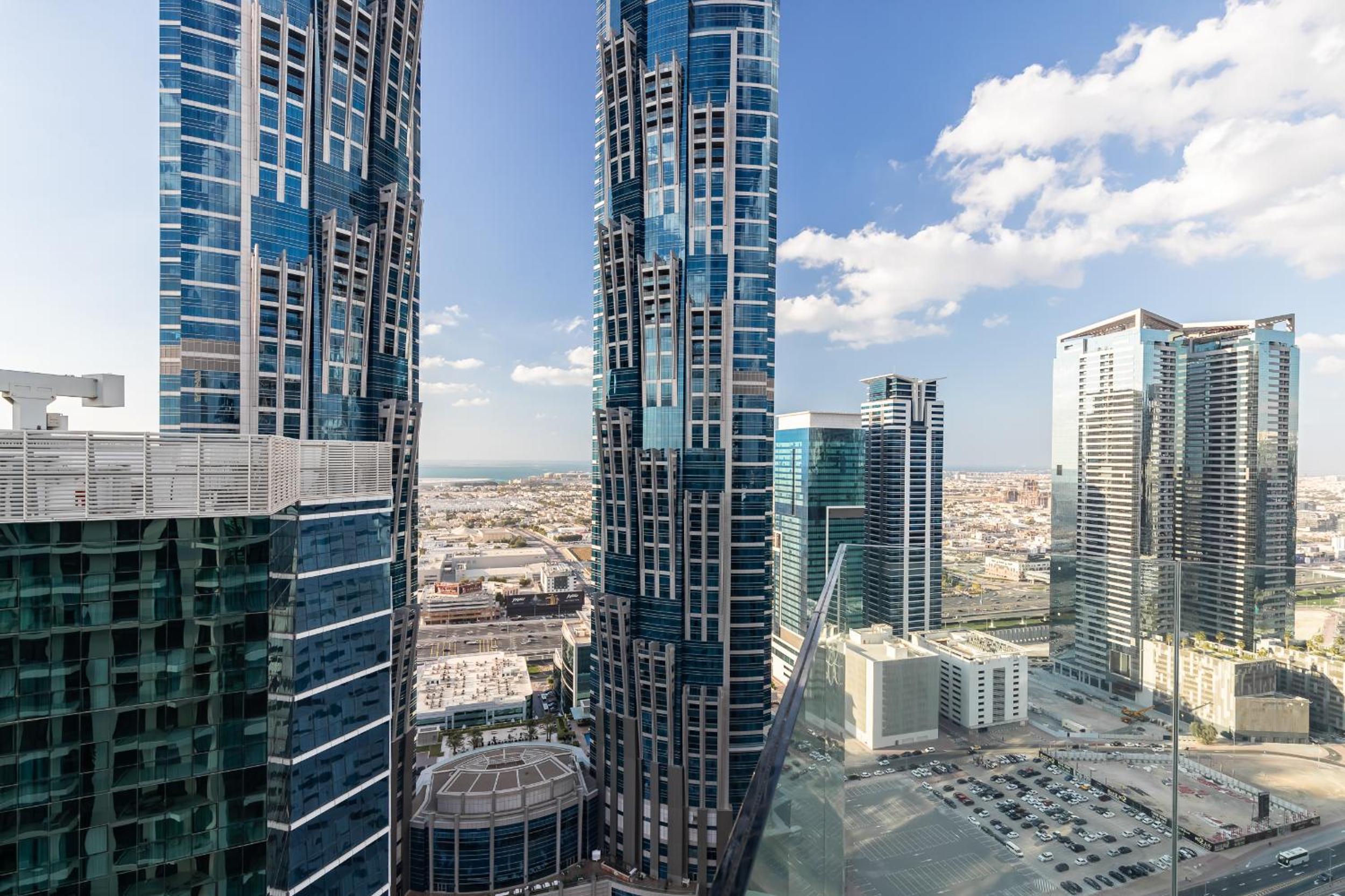 Simply Comfort Vacation Homes Rental in Missoni Top Floor with Sea, Canal and Burj Khalifa Views