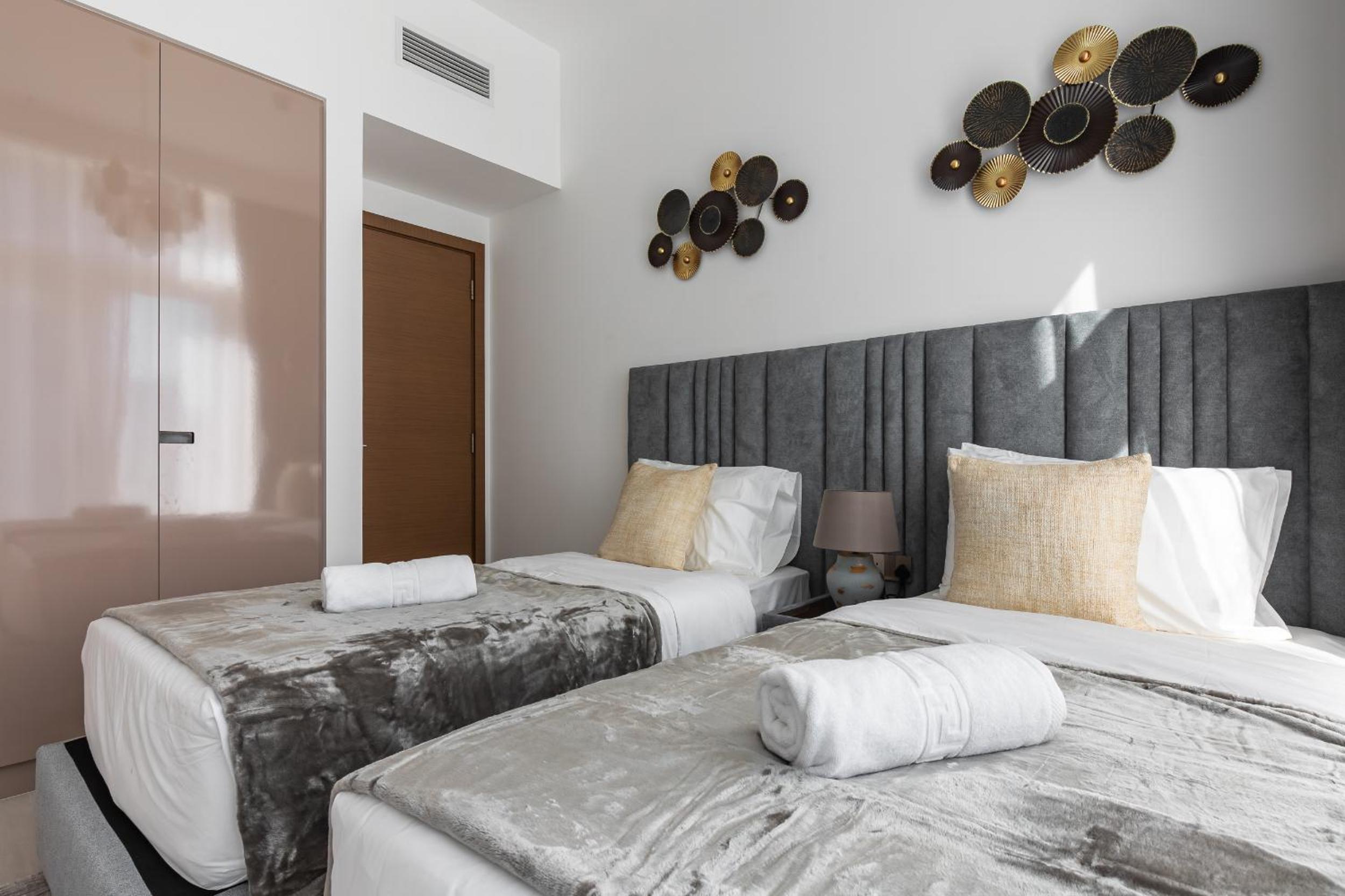 Simply Comfort Vacation Homes Rental in Missoni Top Floor with Sea, Canal and Burj Khalifa Views