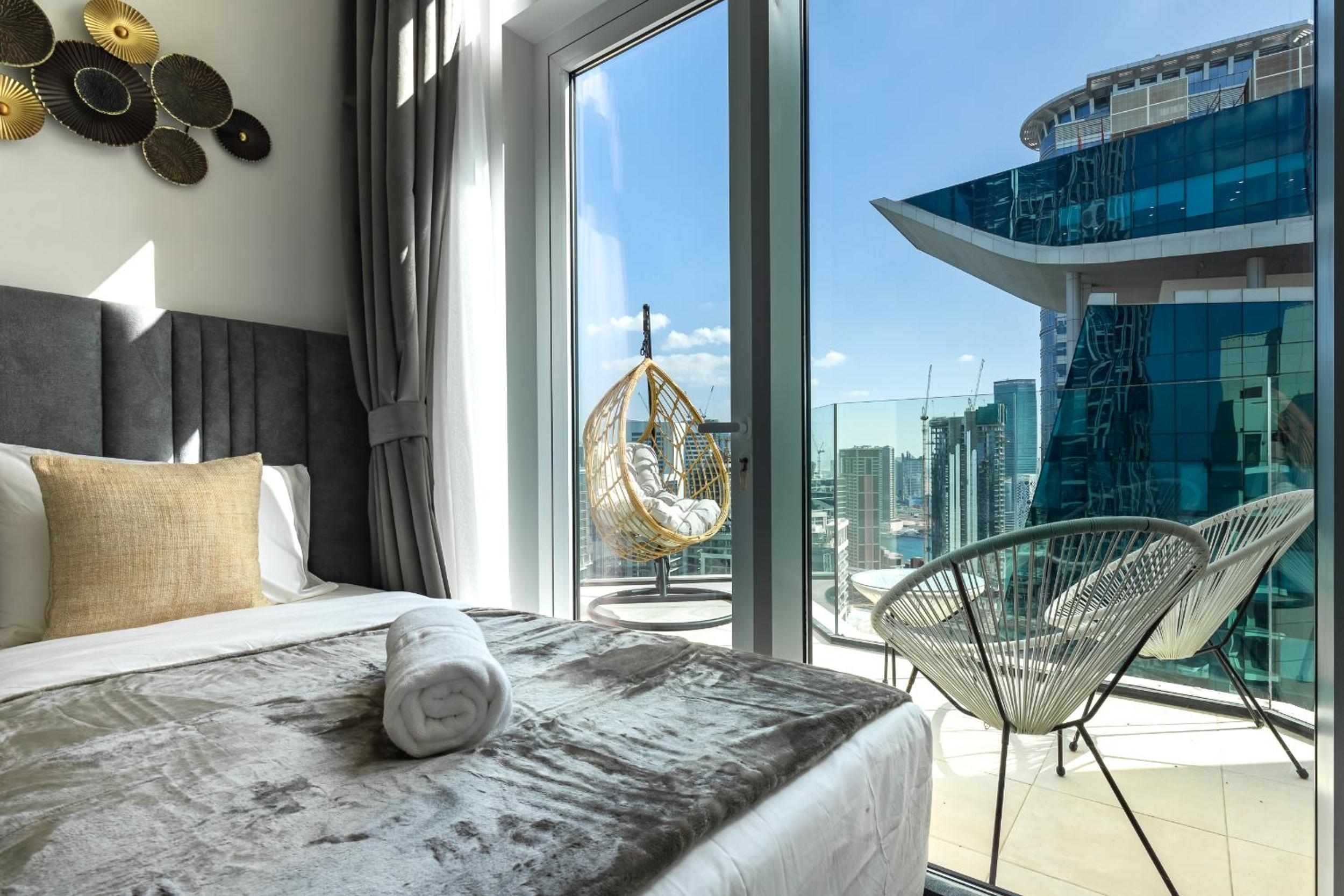 Simply Comfort Vacation Homes Rental in Missoni Top Floor with Sea, Canal and Burj Khalifa Views