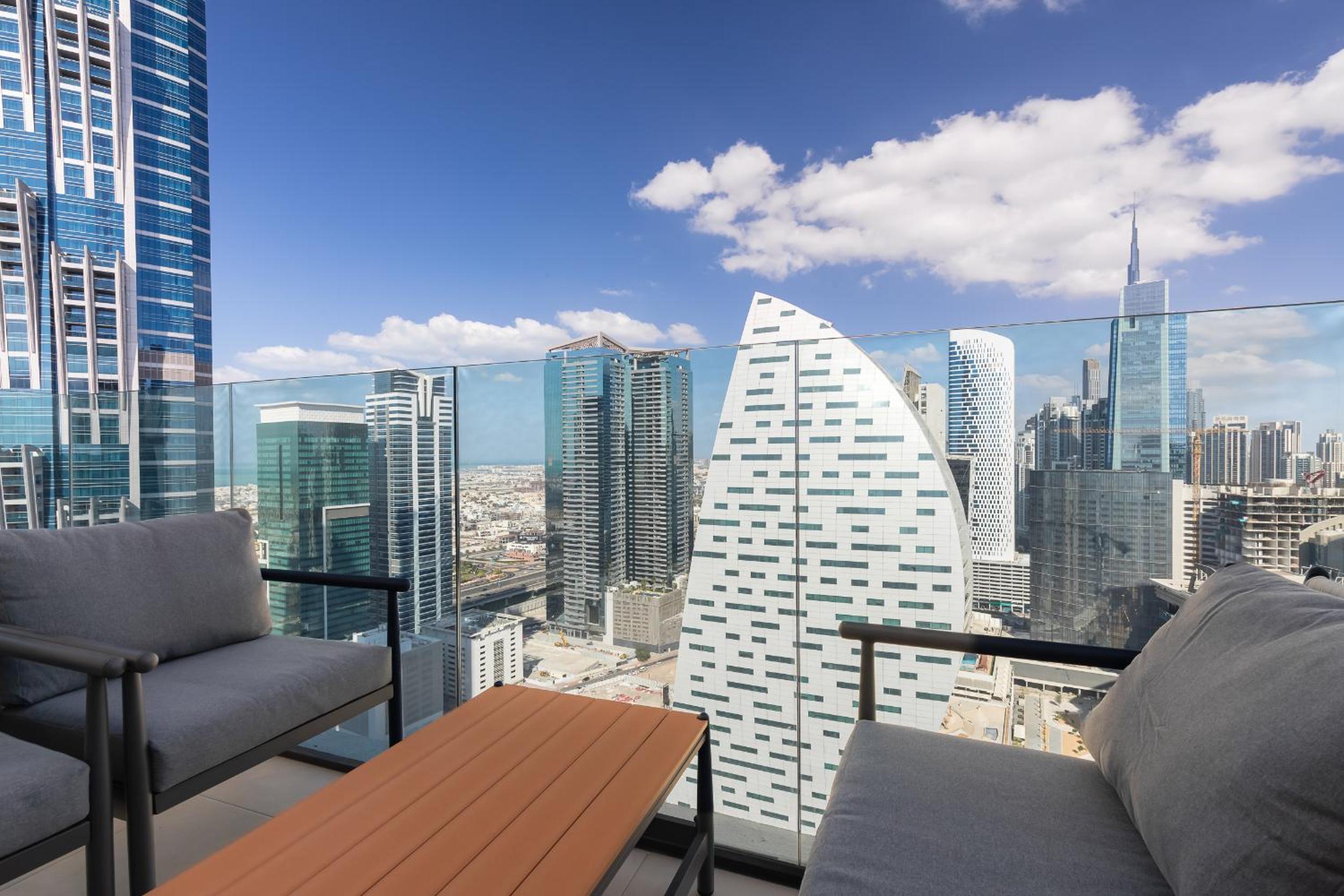 Simply Comfort Vacation Homes Rental in Missoni Top Floor with Sea, Canal and Burj Khalifa Views