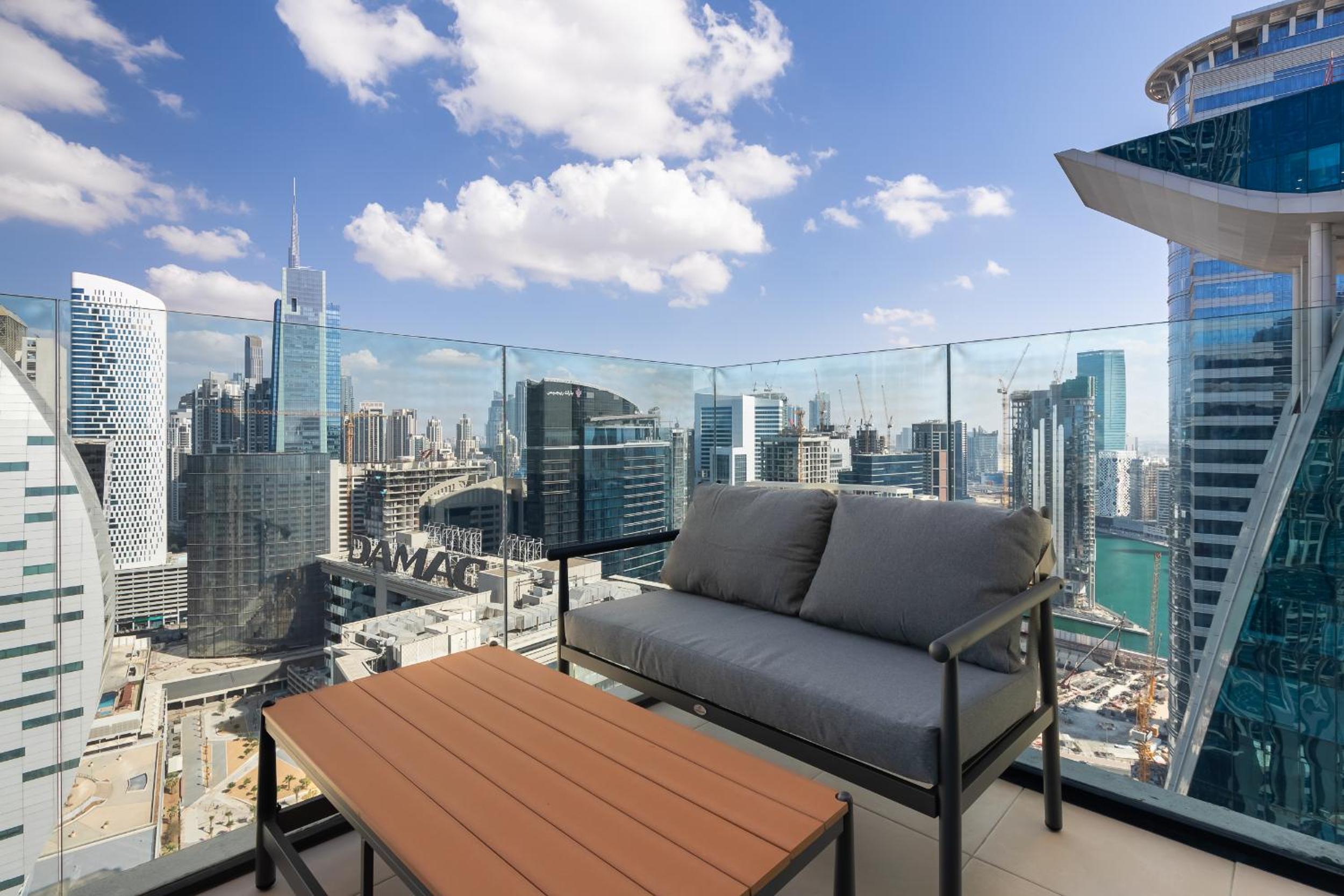 Simply Comfort Vacation Homes Rental in Missoni Top Floor with Sea, Canal and Burj Khalifa Views