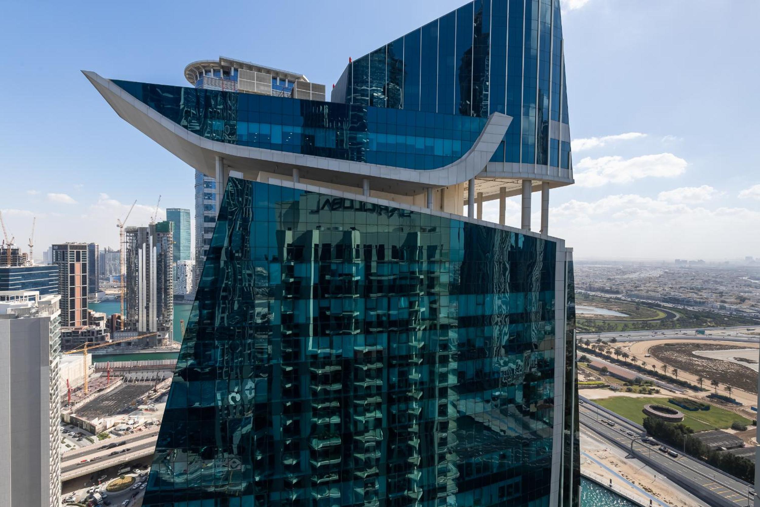 Simply Comfort Vacation Homes Rental in Missoni Top Floor with Sea, Canal and Burj Khalifa Views
