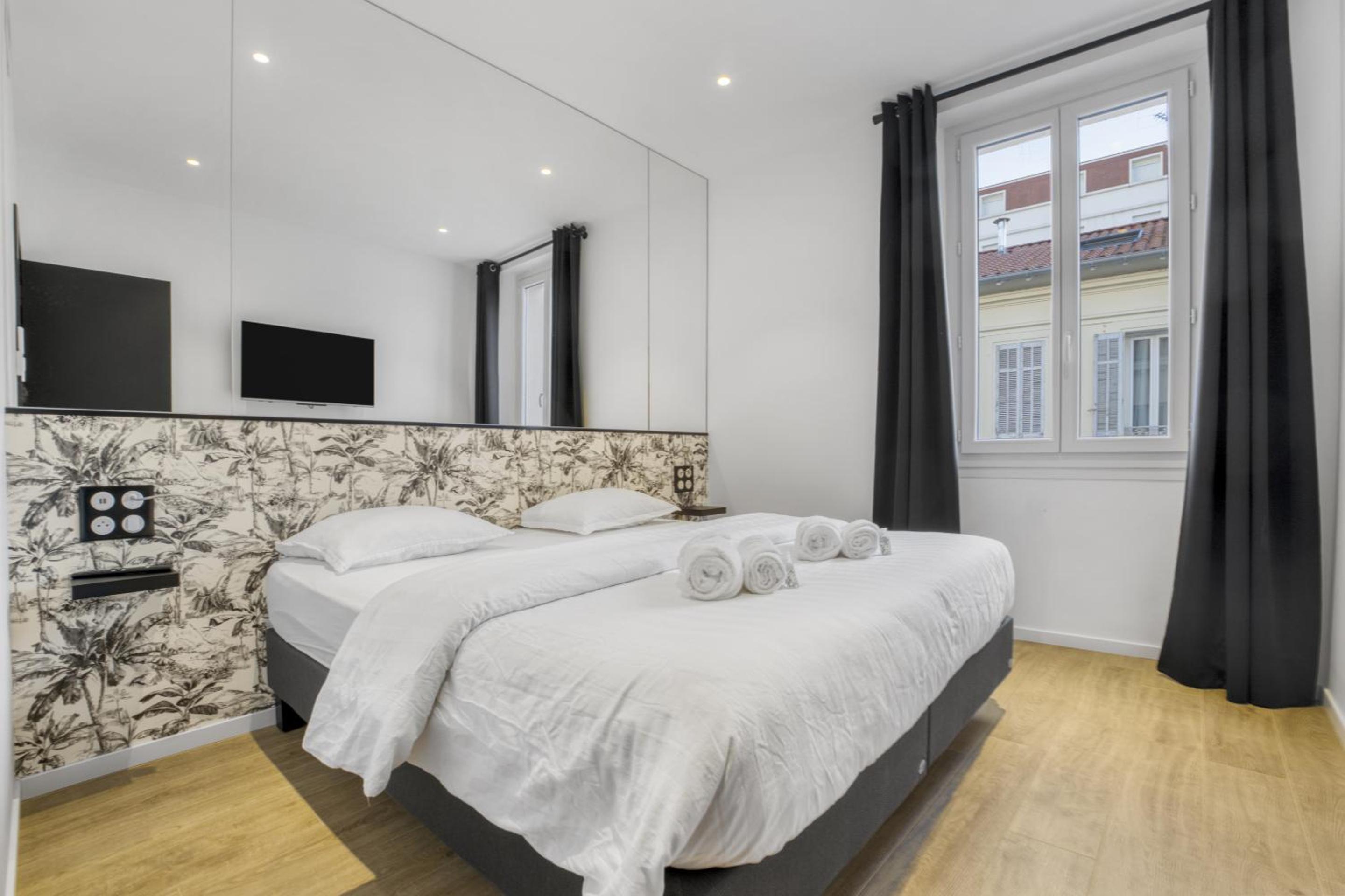 2 chambres - 2 min du Palais - Climatisé - Calme
