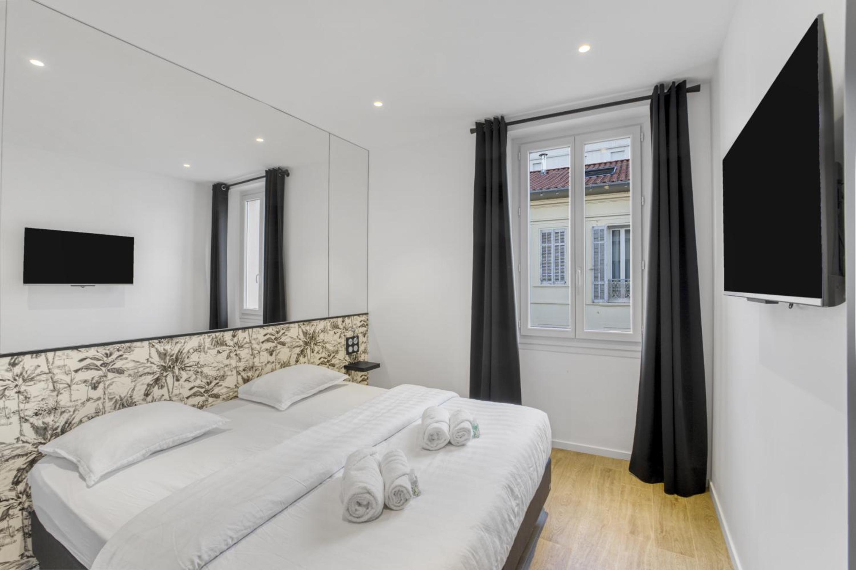 2 chambres - 2 min du Palais - Climatisé - Calme