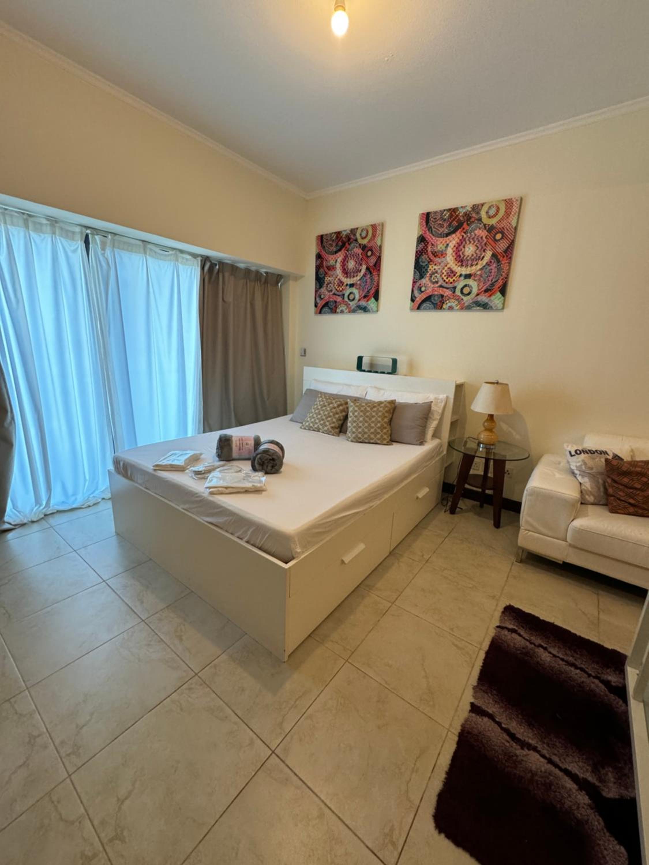 Click Stay - JLT - Studio & Balcony Lakes view Entire Apartment -RA
