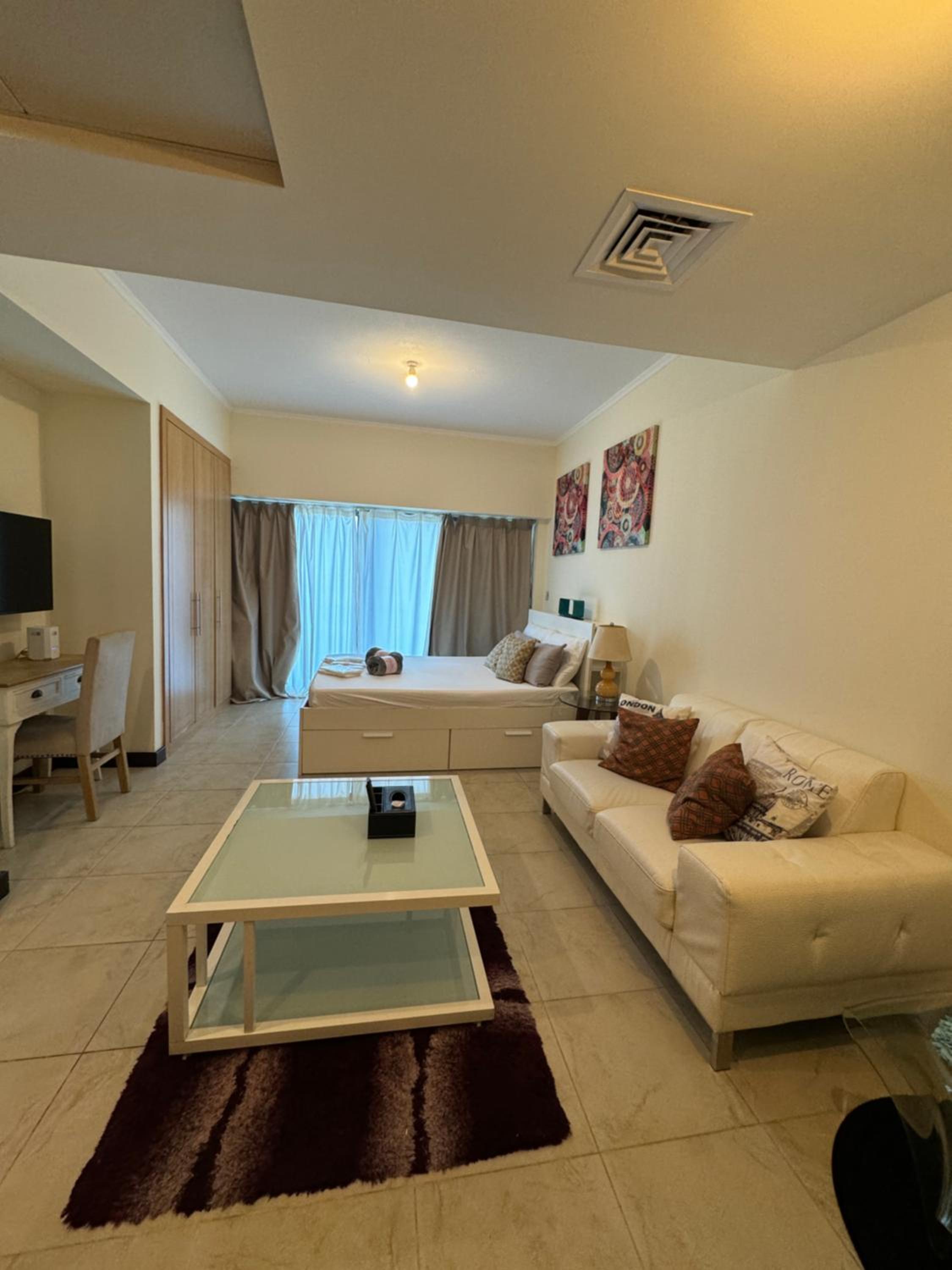 Click Stay - JLT - Studio & Balcony Lakes view Entire Apartment -RA