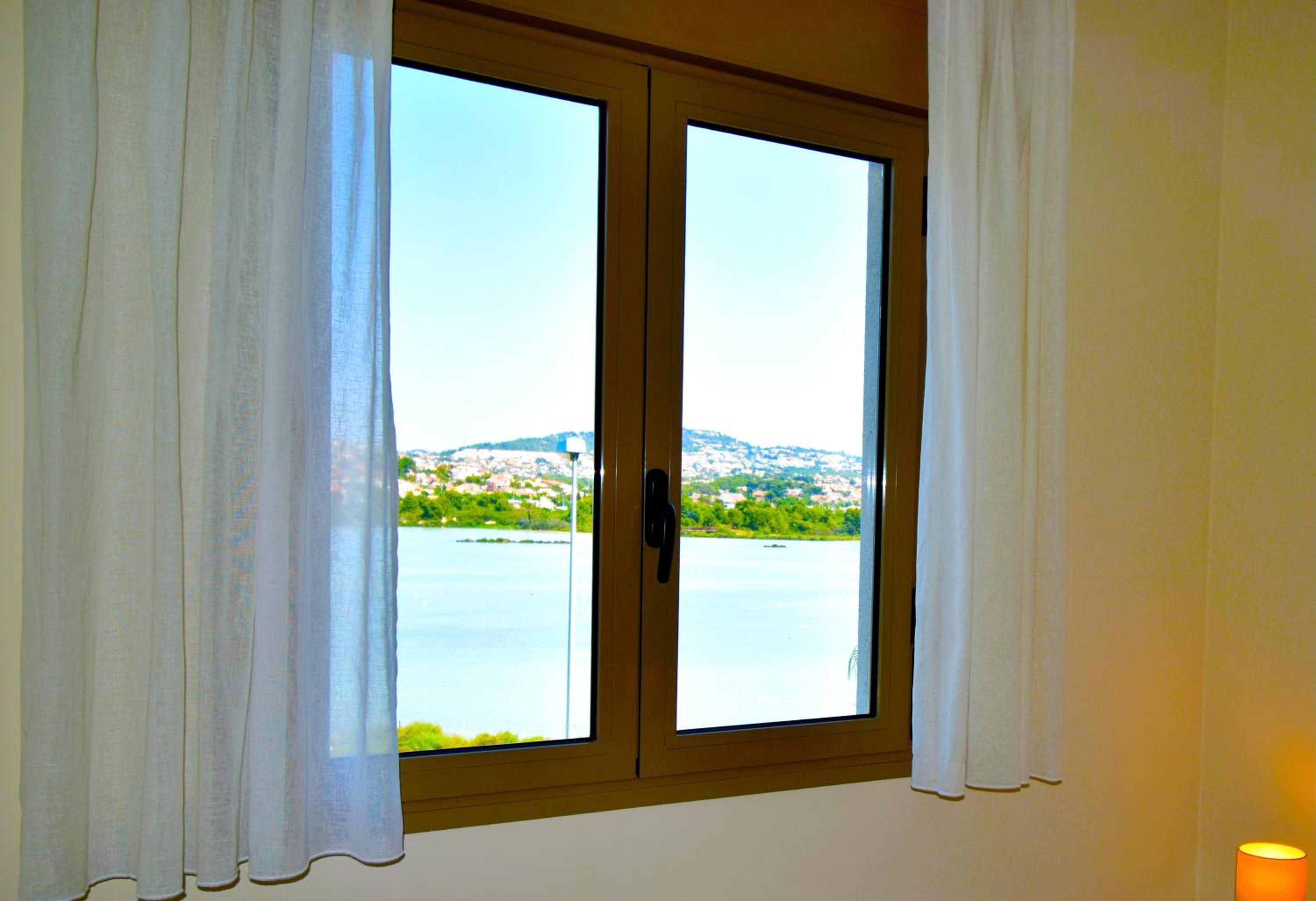 Apartamento Larimar 2 habitaciones , Piscina , Parking y vistas a la laguna