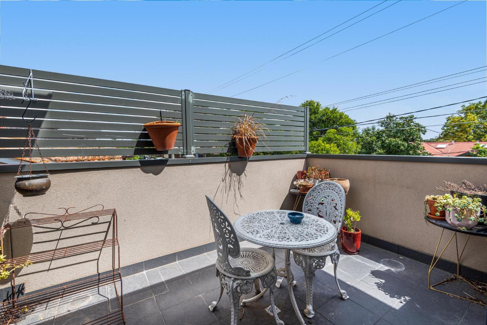 Charming Retro Townhouse in Vibrant Coburg