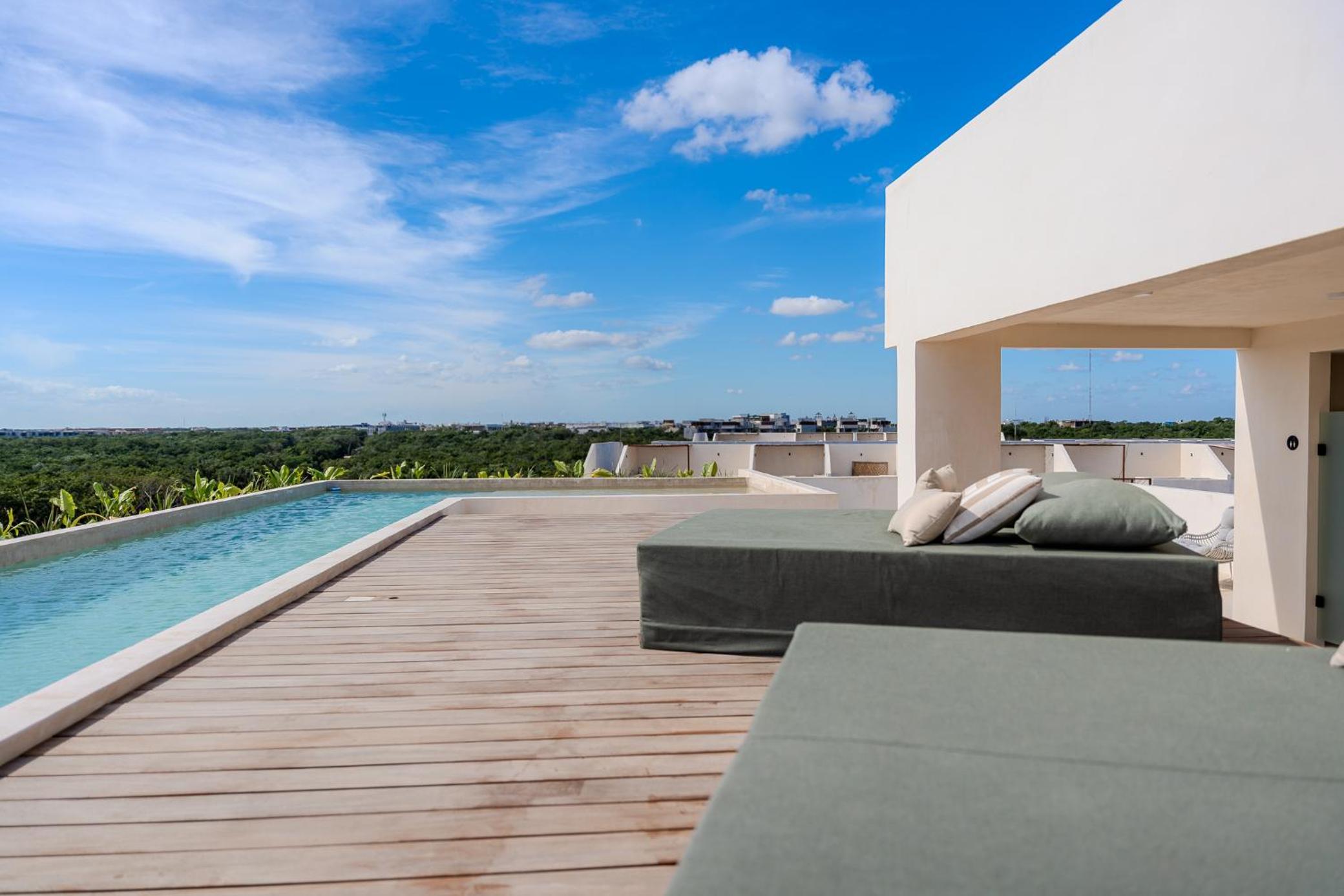 Tropical 2 Bedroom | Private Balcony & Rooftop | Casago