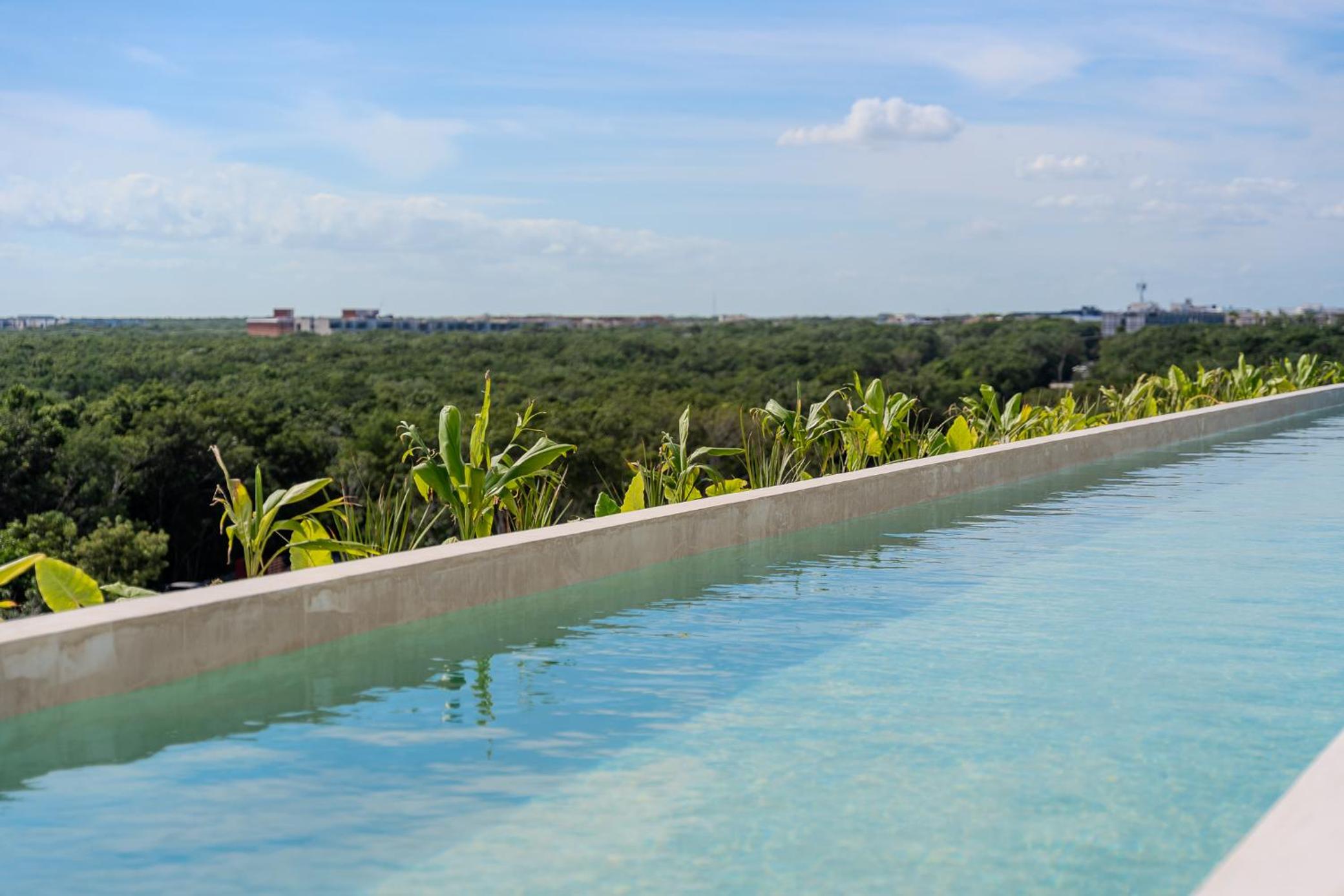 Tropical 2 Bedroom | Private Balcony & Rooftop | Casago