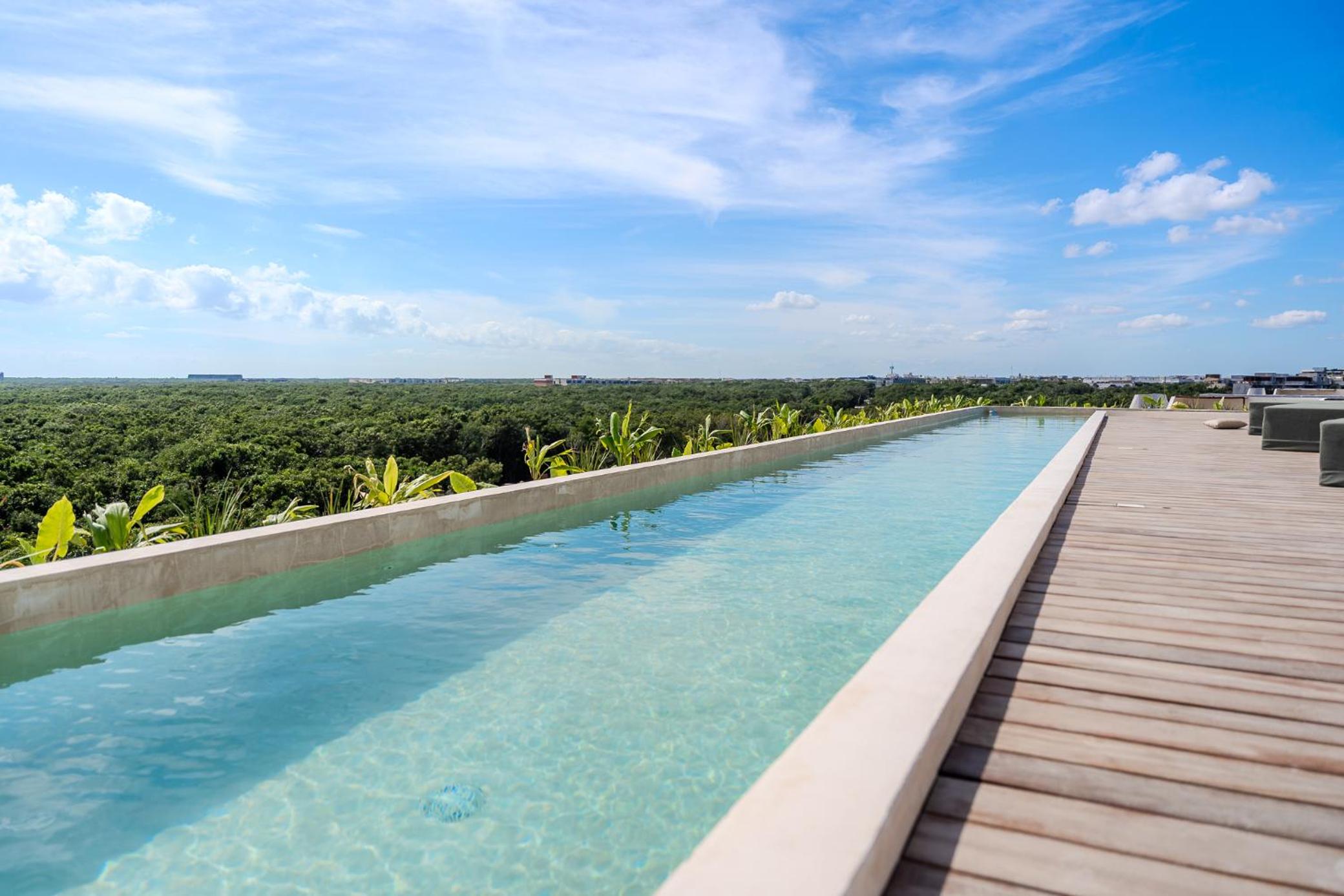 Tropical 2 Bedroom | Private Balcony & Rooftop | Casago