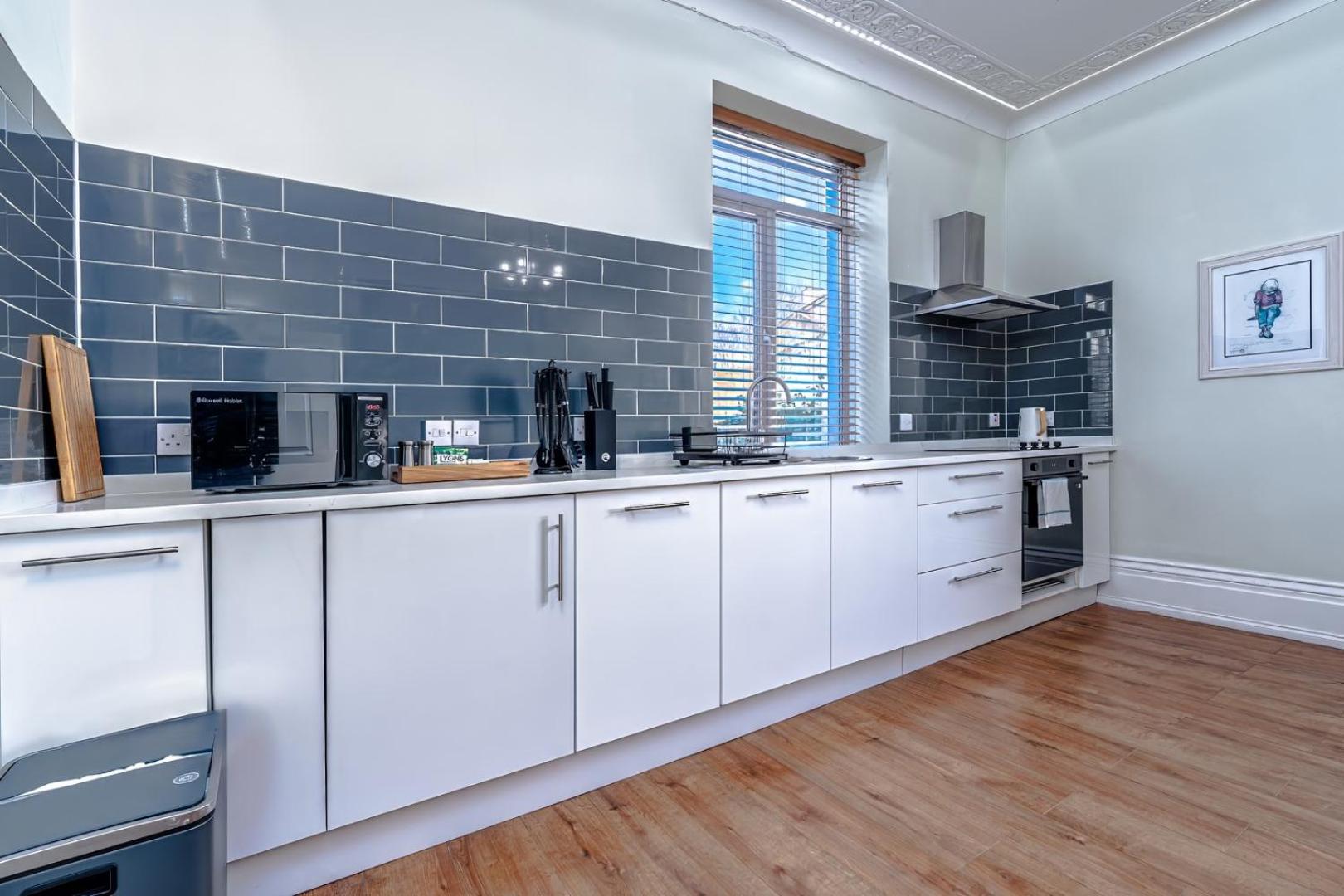 Designer Flat with City Views and Full Kitchen