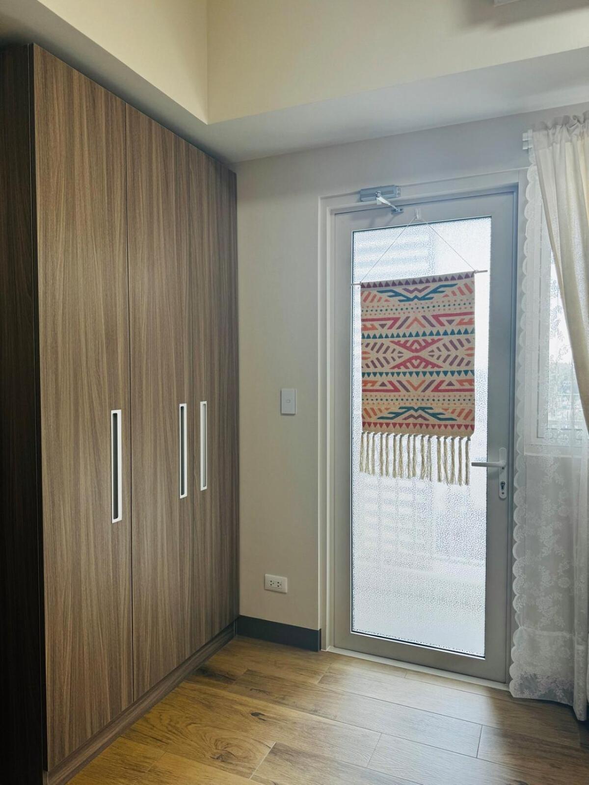 7FF Cozy 1BR Park McKinley West near BGC & Venice Mall