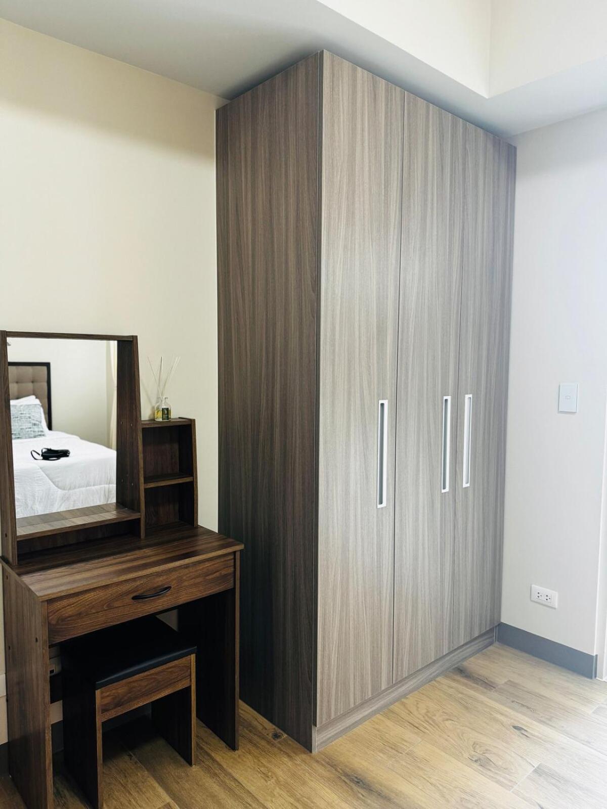 7FF Cozy 1BR Park McKinley West near BGC & Venice Mall