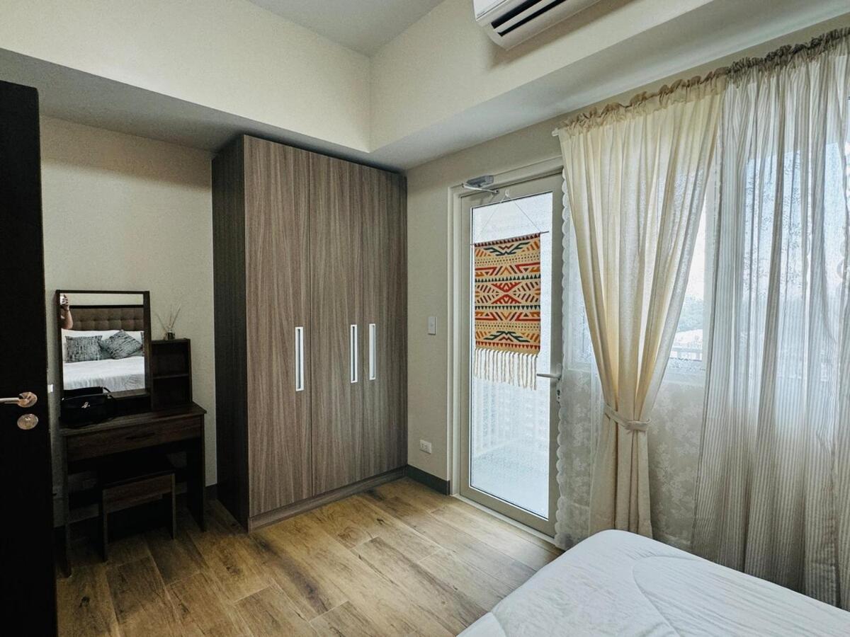 7FF Cozy 1BR Park McKinley West near BGC & Venice Mall