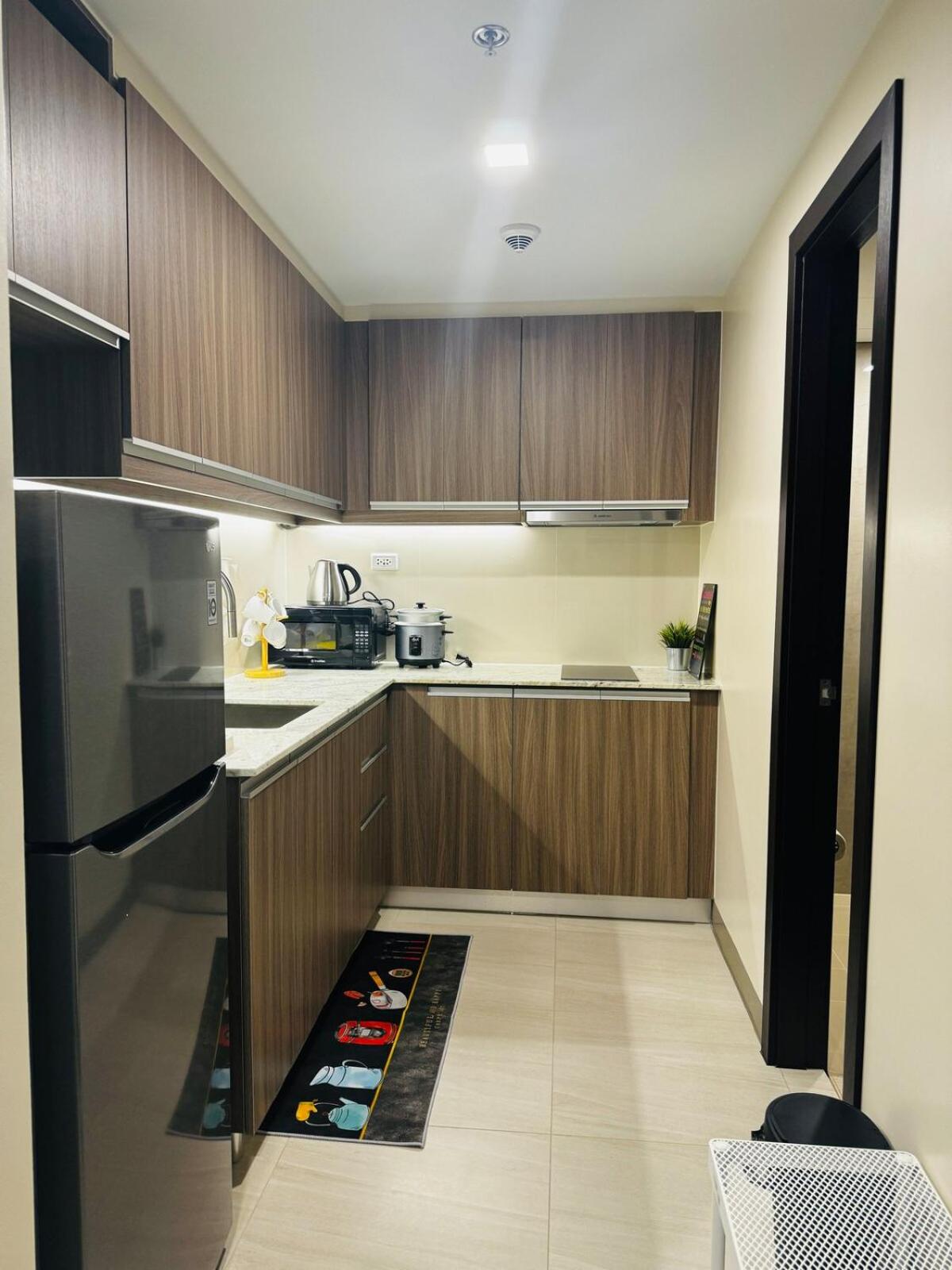 7FF Cozy 1BR Park McKinley West near BGC & Venice Mall